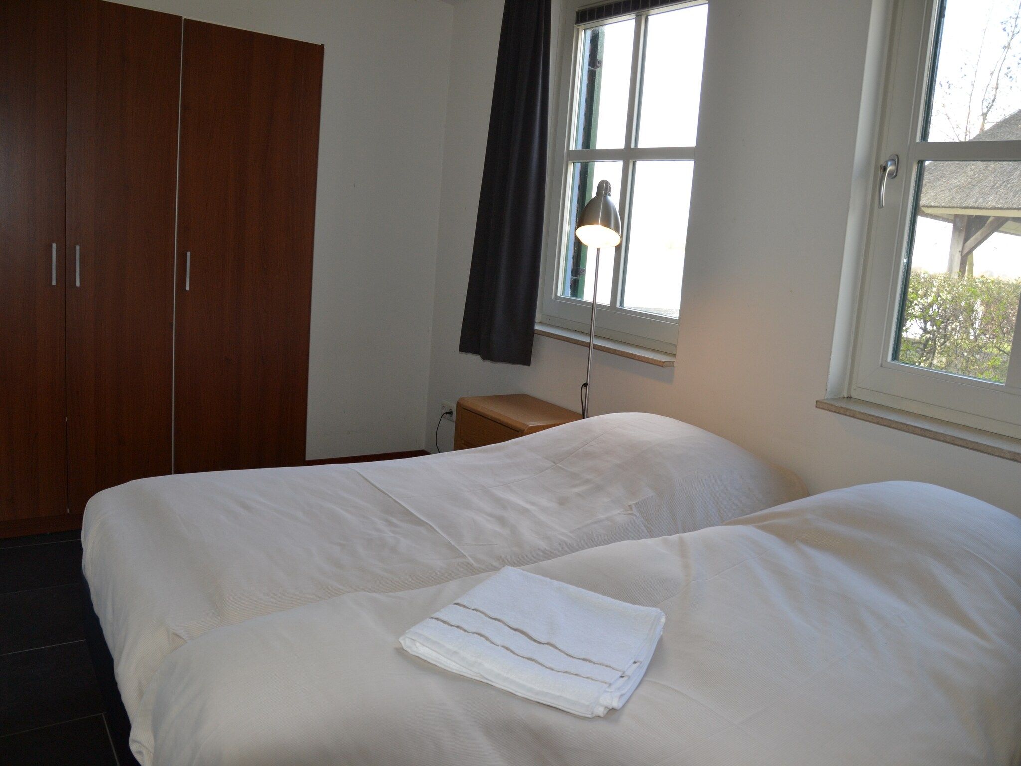 Een slaapkamer van Waterpark Belterwiede 3 in Wanneperveen