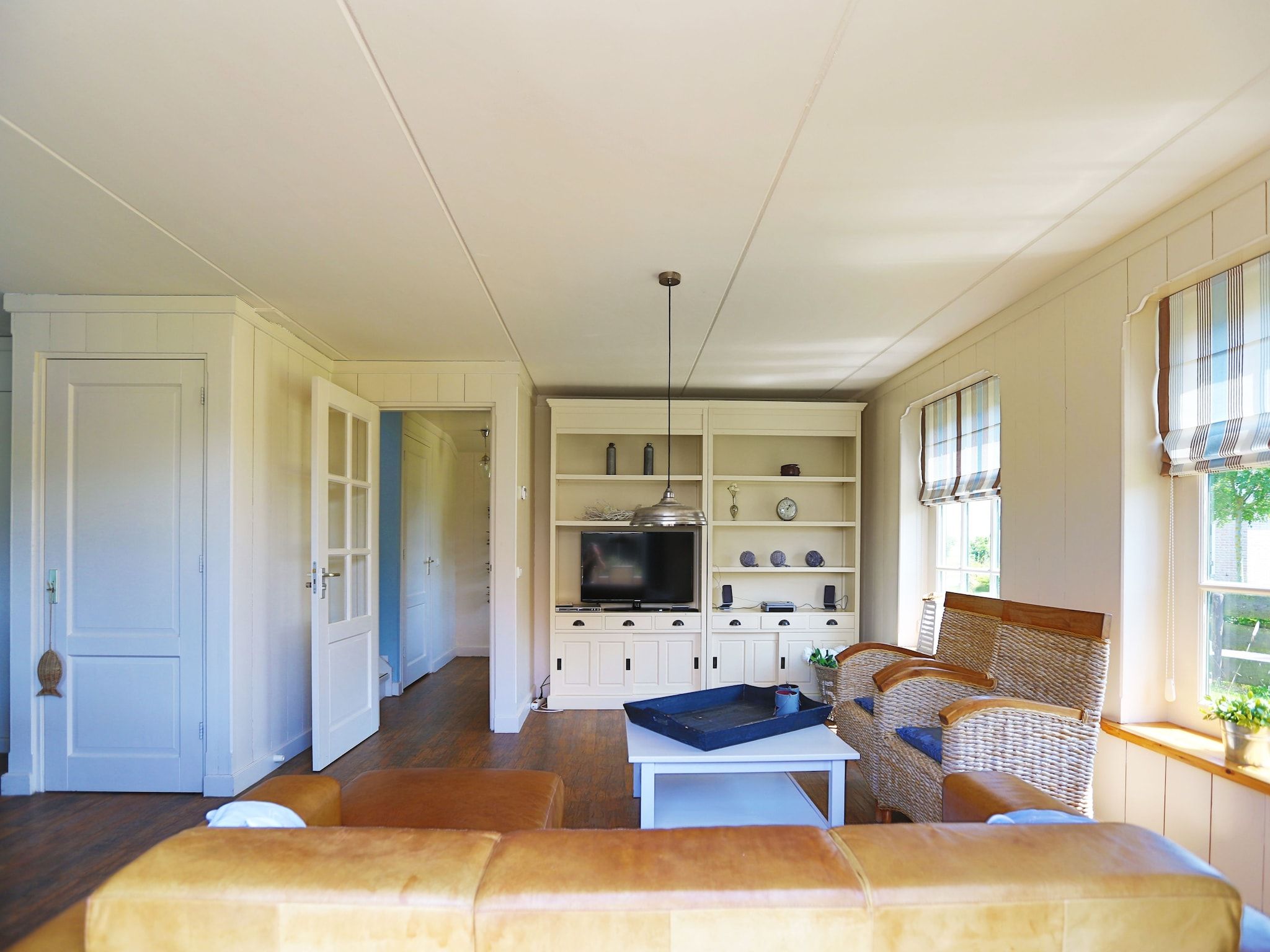 De woonkamer van Recreatiepark Wiringherlant  - Villa 4 in Hippolytushoef