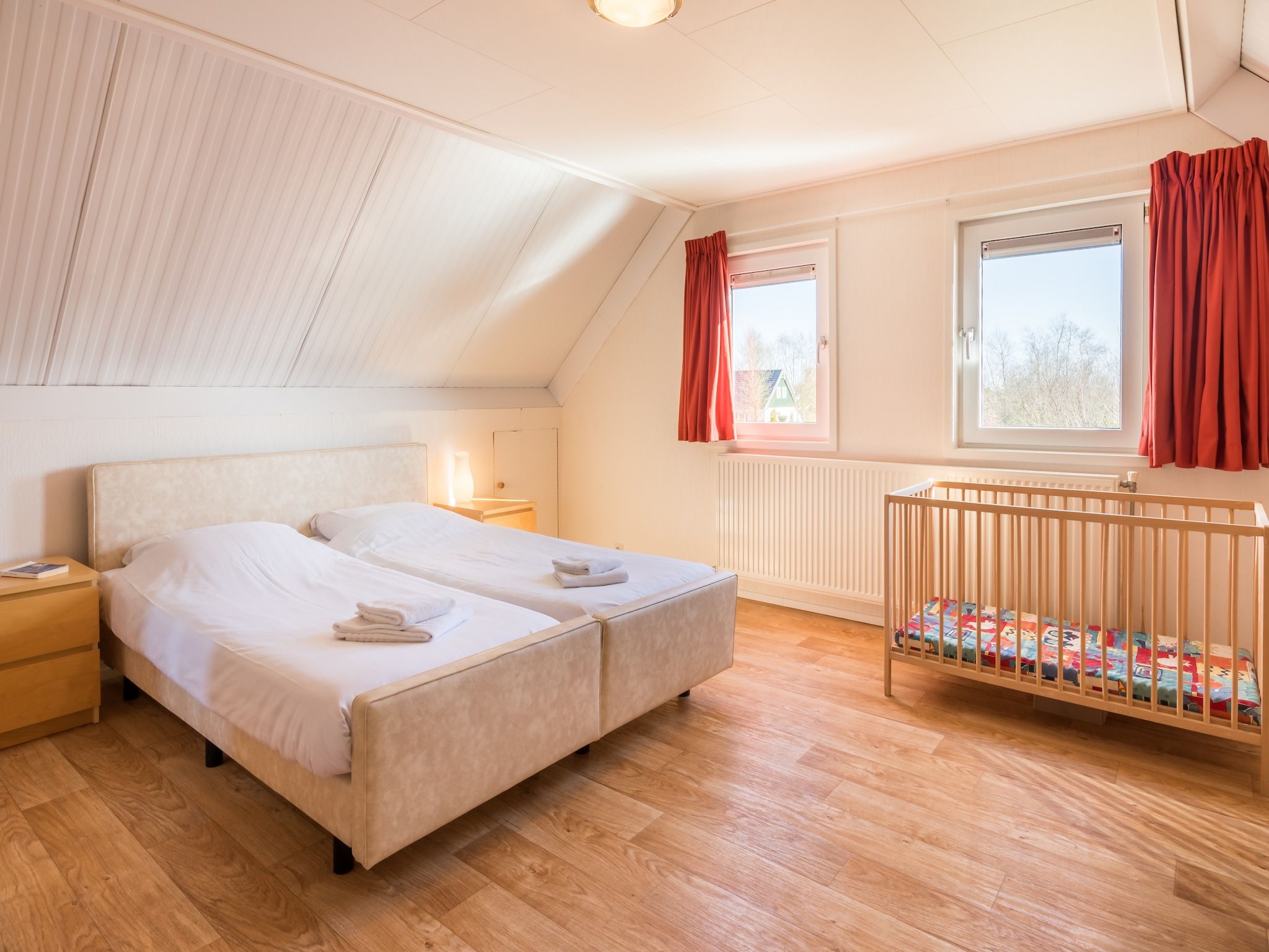 Een slaapkamer van Hunzepark 7 in Gasselternijveen