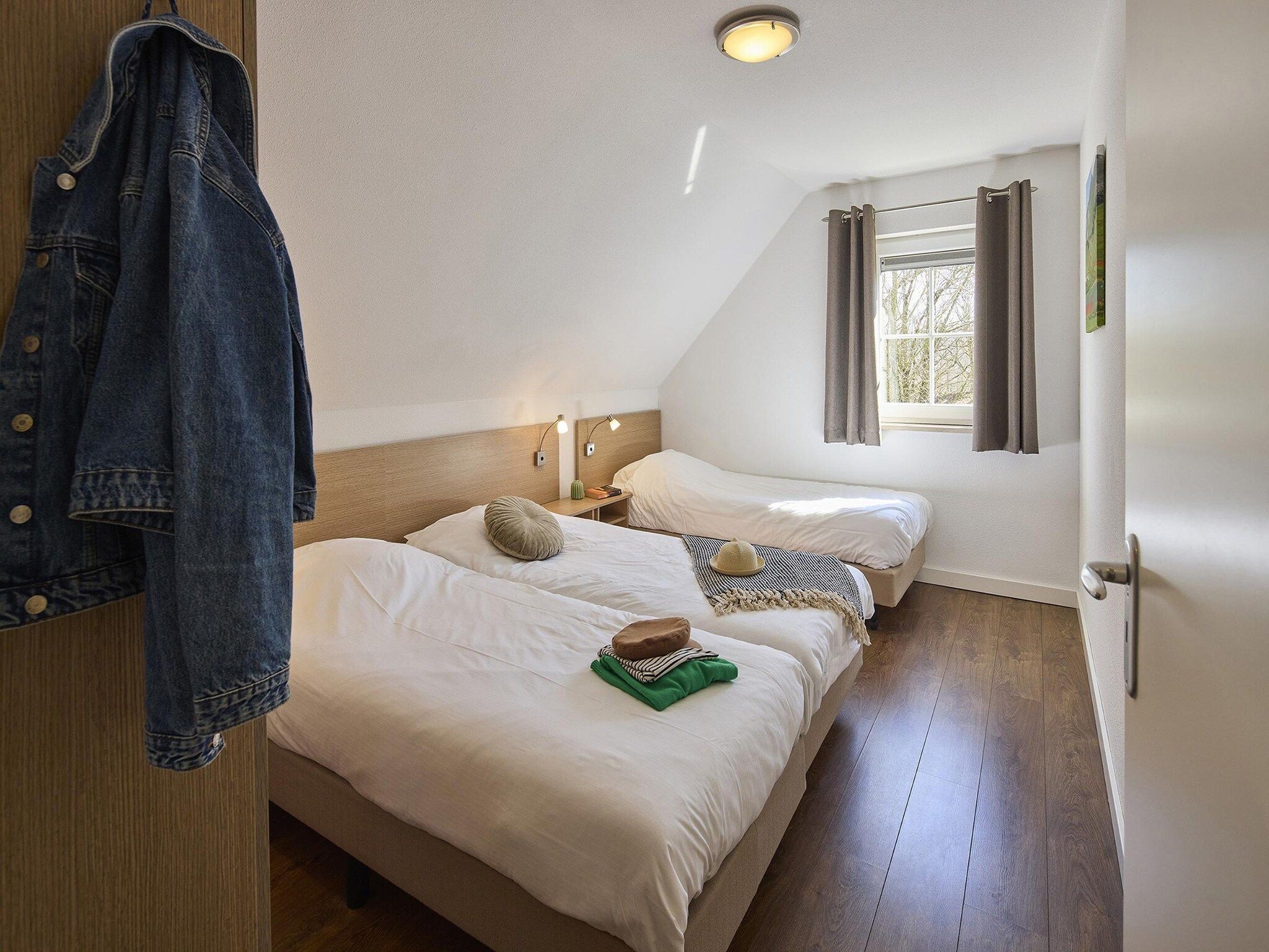 Een slaapkamer van Buitenhof De Leistert 10 in Roggel