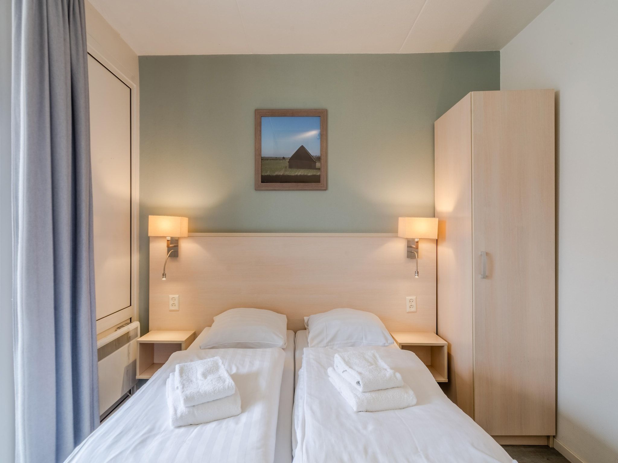 Een slaapkamer van Bosch en Zee 4 in De Koog Texel