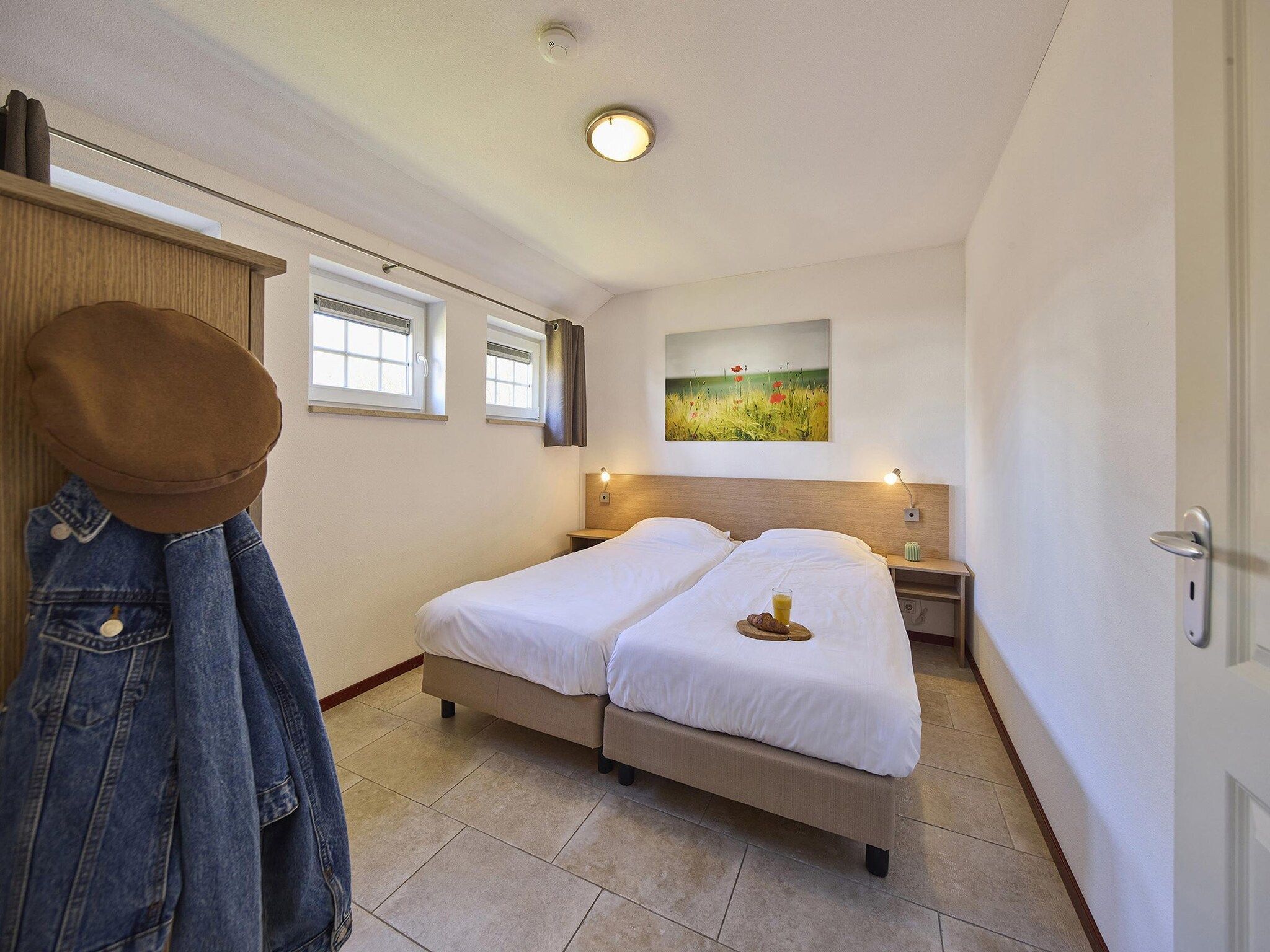 Een slaapkamer van Buitenhof De Leistert 8 in Roggel