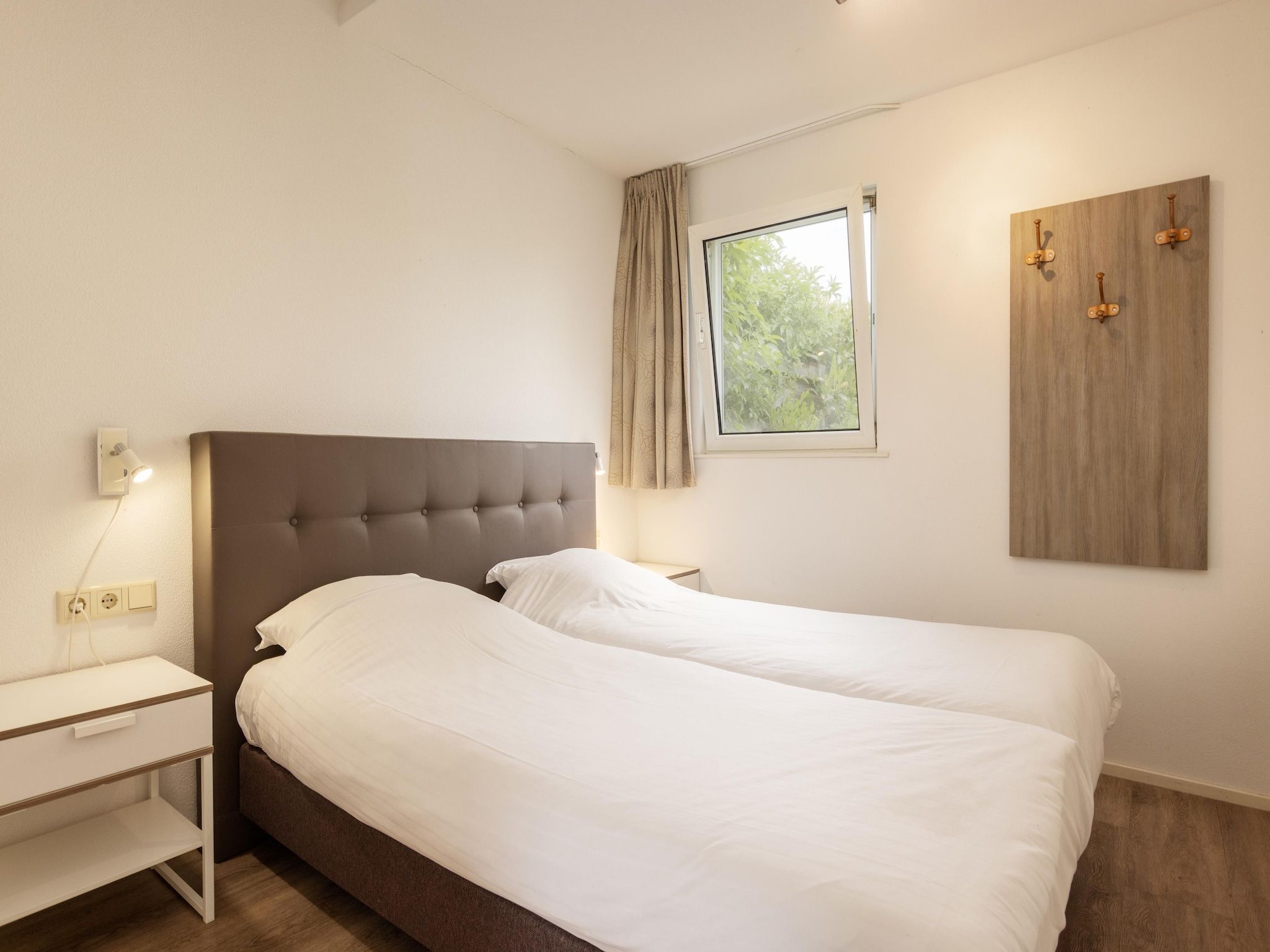 Een slaapkamer van Buitenplaats It Wiid 1 in Eernewoud