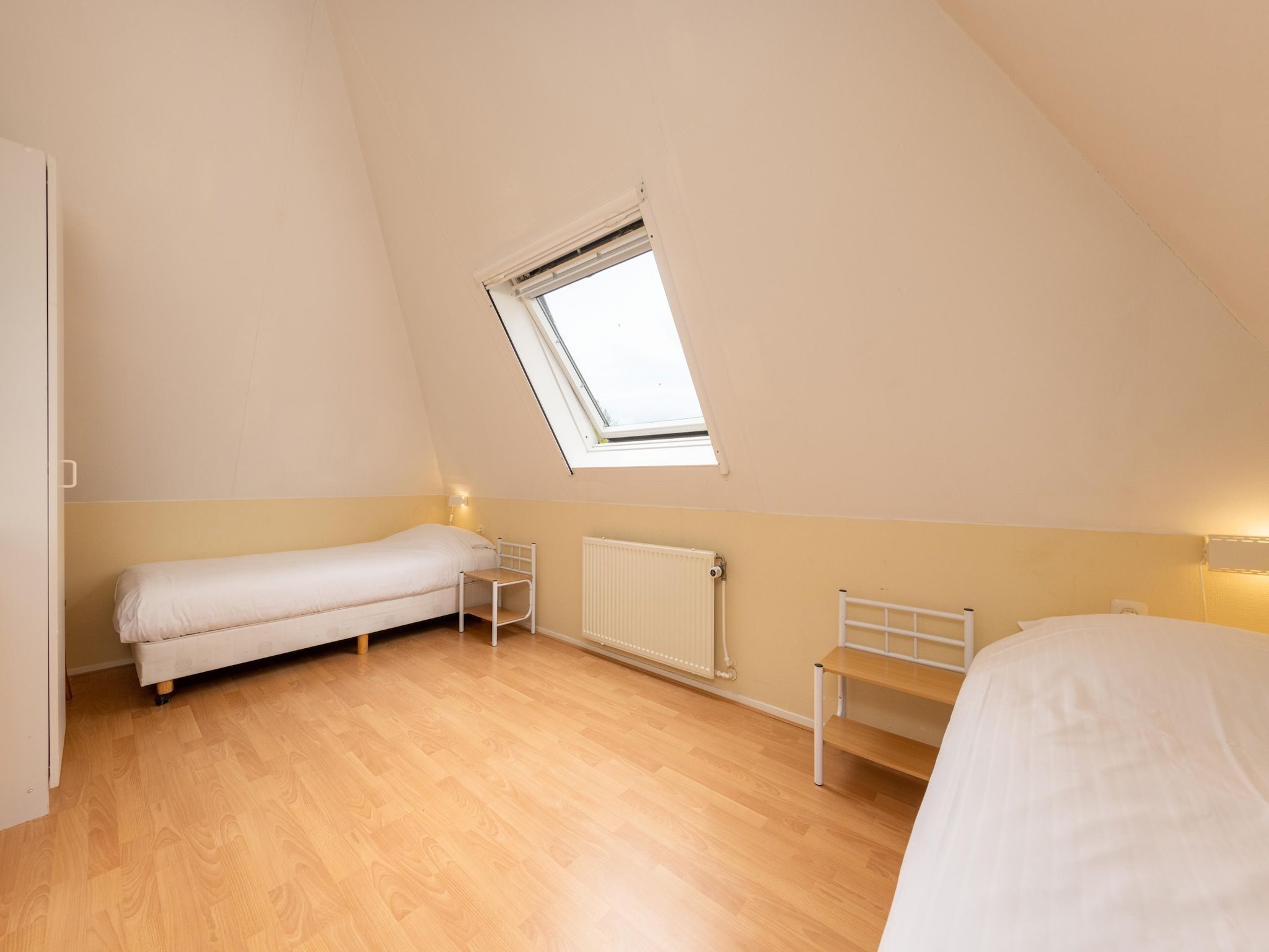 Een slaapkamer van Buitenplaats It Wiid 1 in Eernewoud