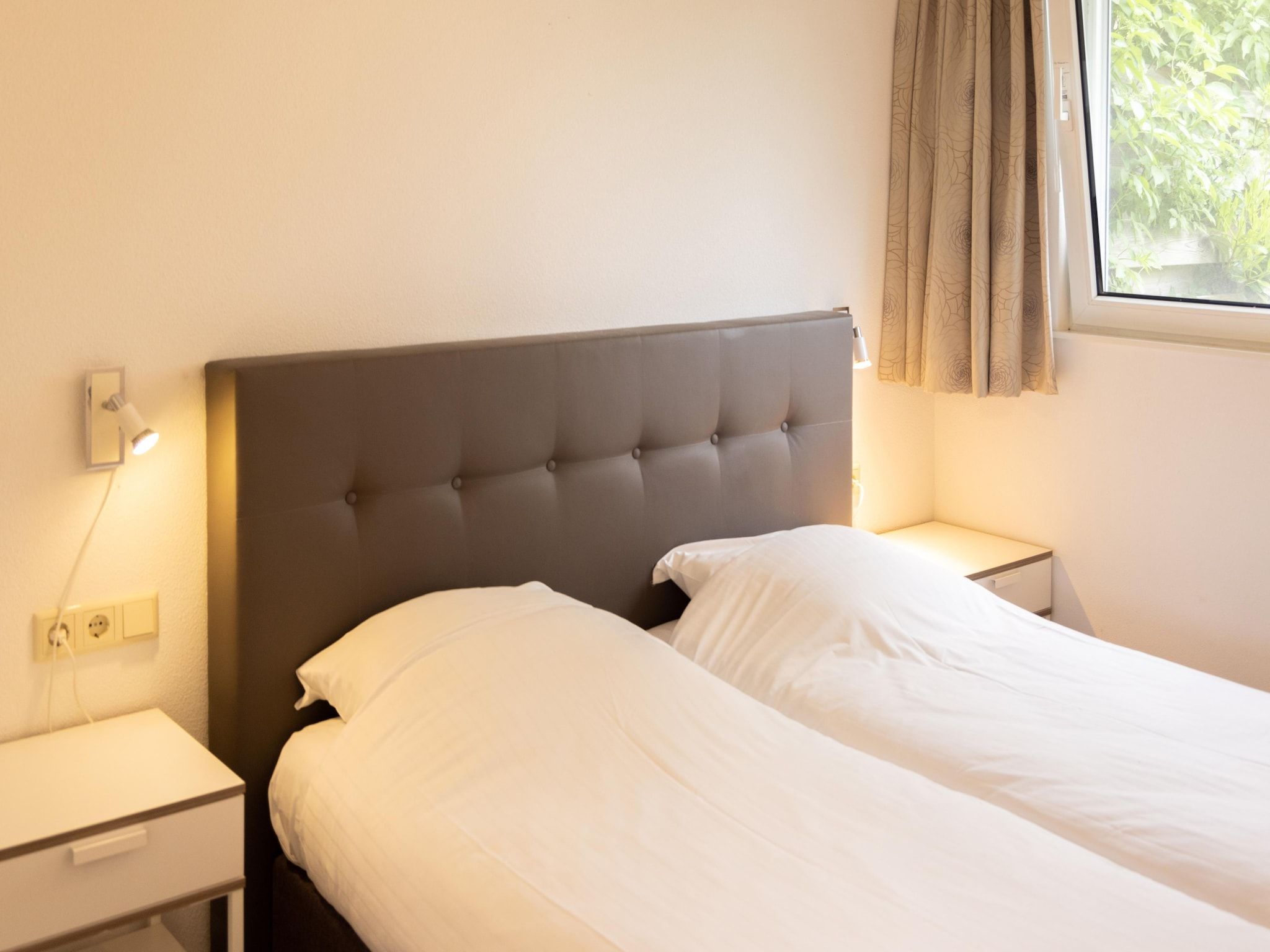 Een slaapkamer van Buitenplaats It Wiid 1 in Eernewoud