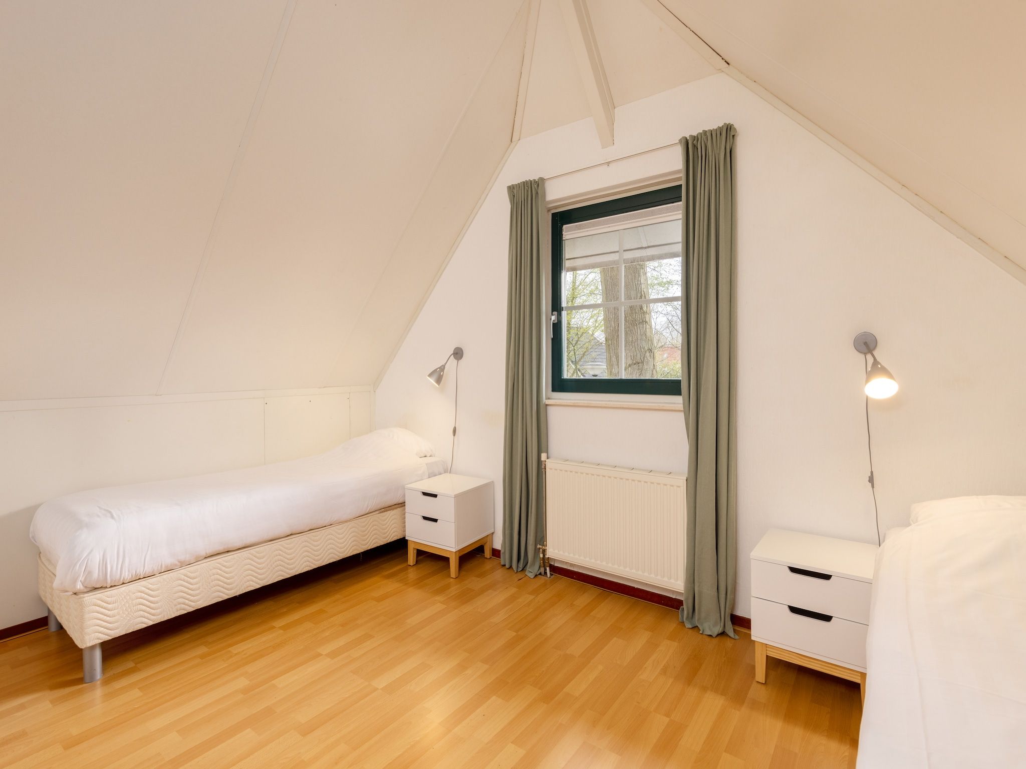 Een slaapkamer van Recreatiepark Tolplas 10 in Hoge Hexel