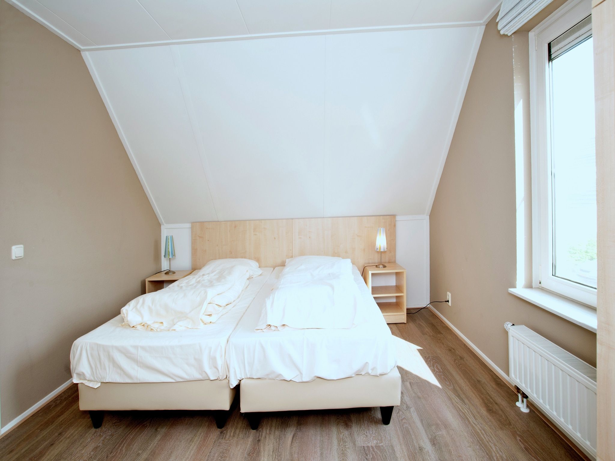 Een slaapkamer van Venwoning 2-6 persoons in Heel