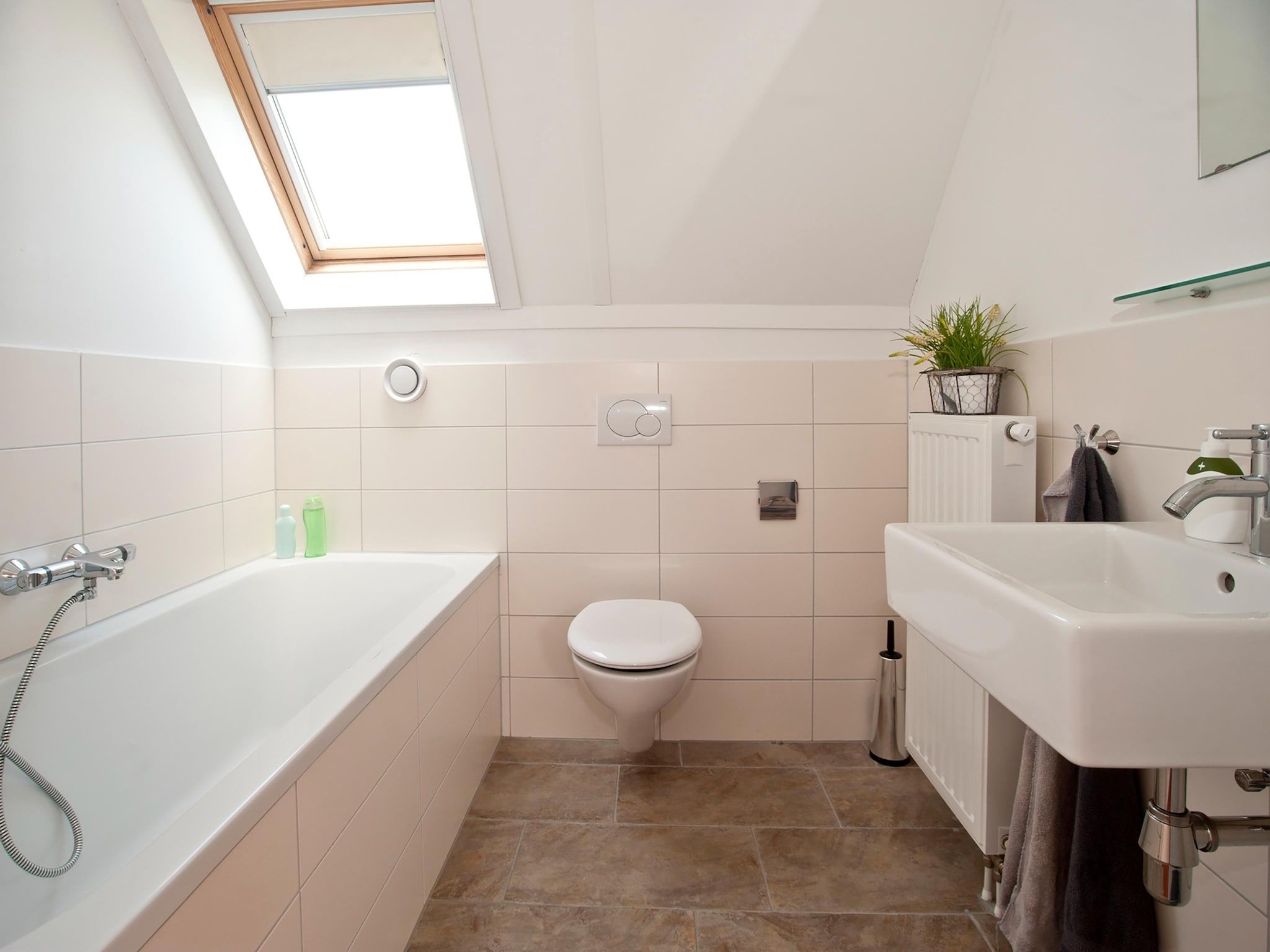 De badkamer van Tuinvilla 2-6 persoons in Heel