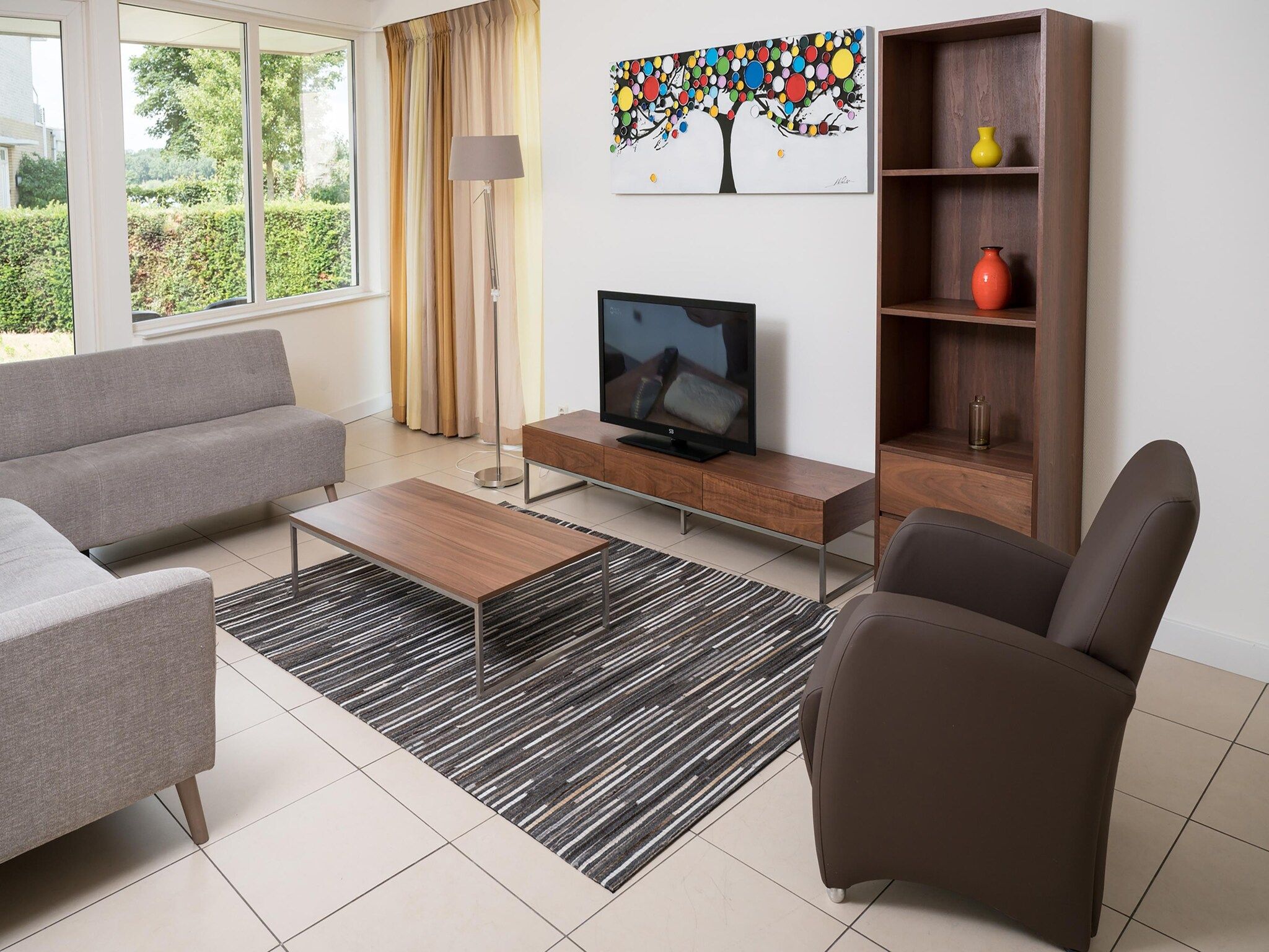 De woonkamer van Tuinvilla 2-4 persoons in Heel