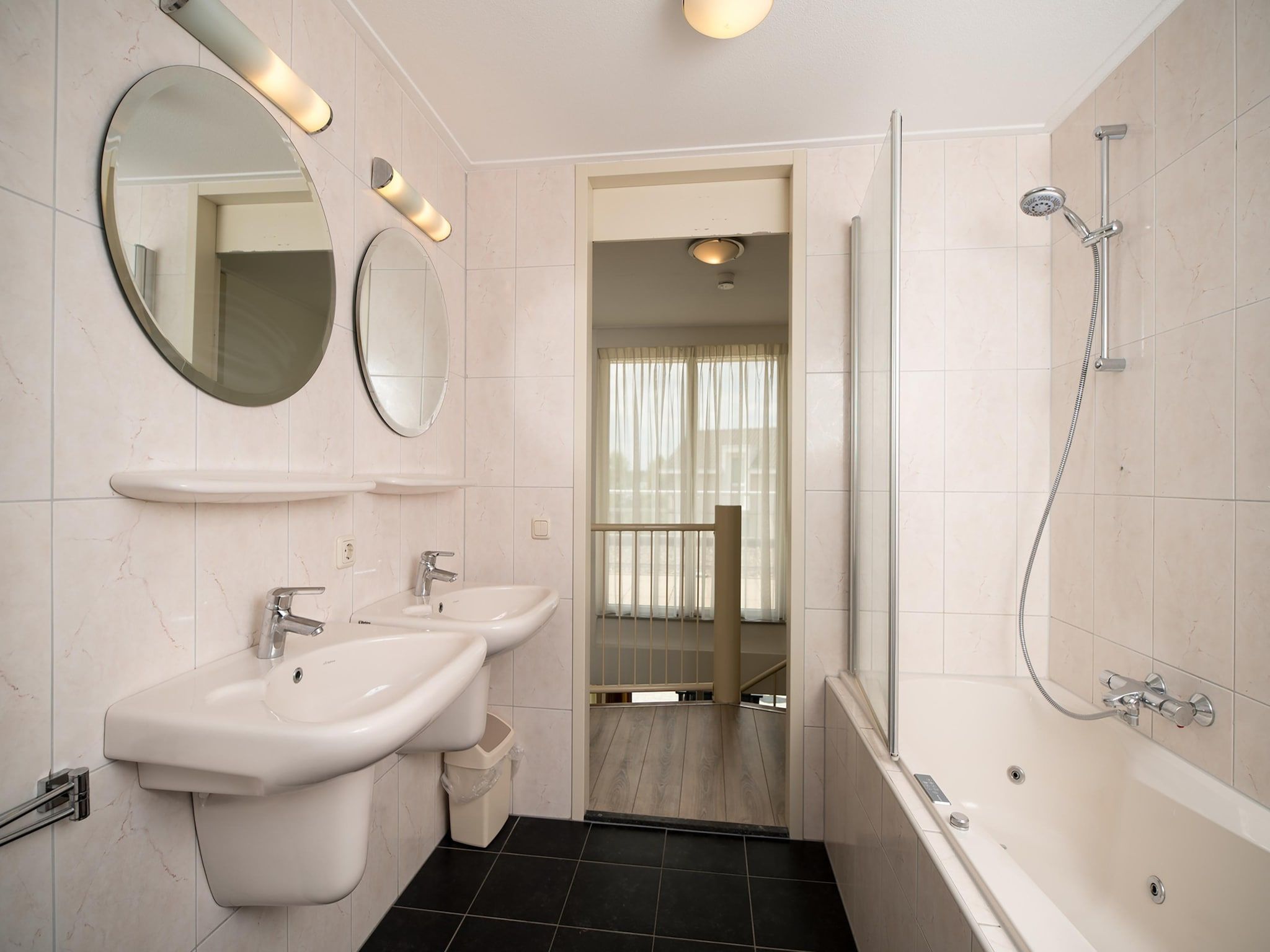 De badkamer van Tuinvilla 2-4 persoons in Heel