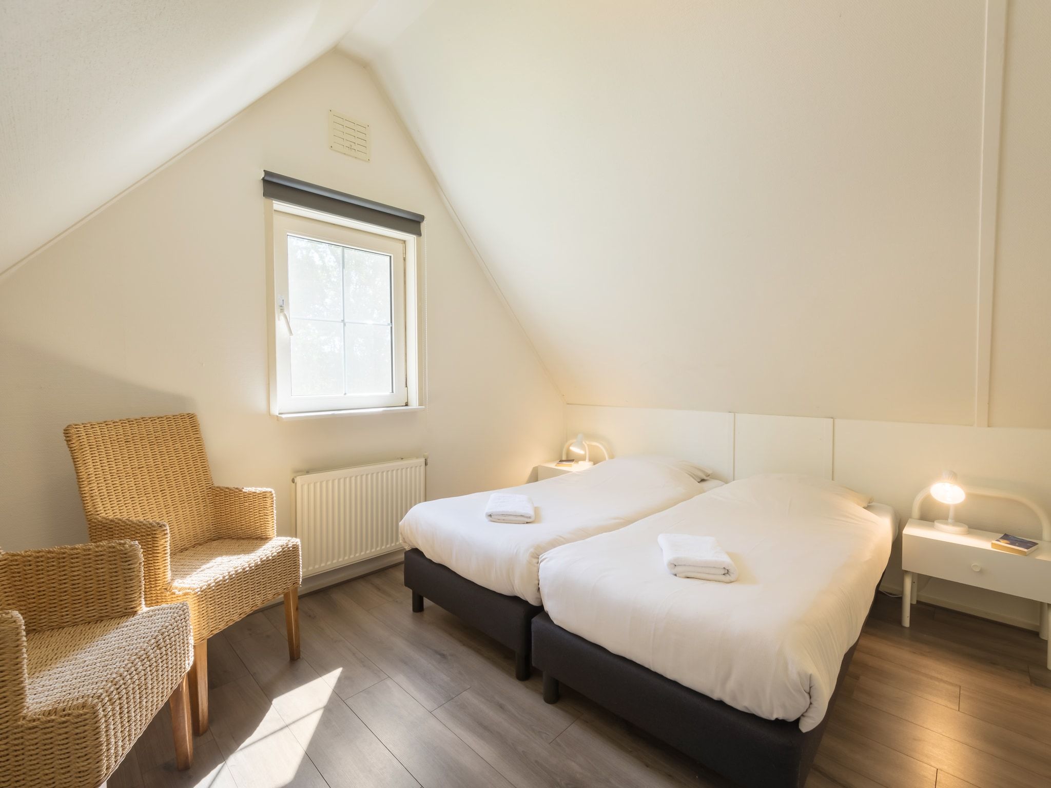 Een slaapkamer van Villapark De Weerribben 1 in Paasloo