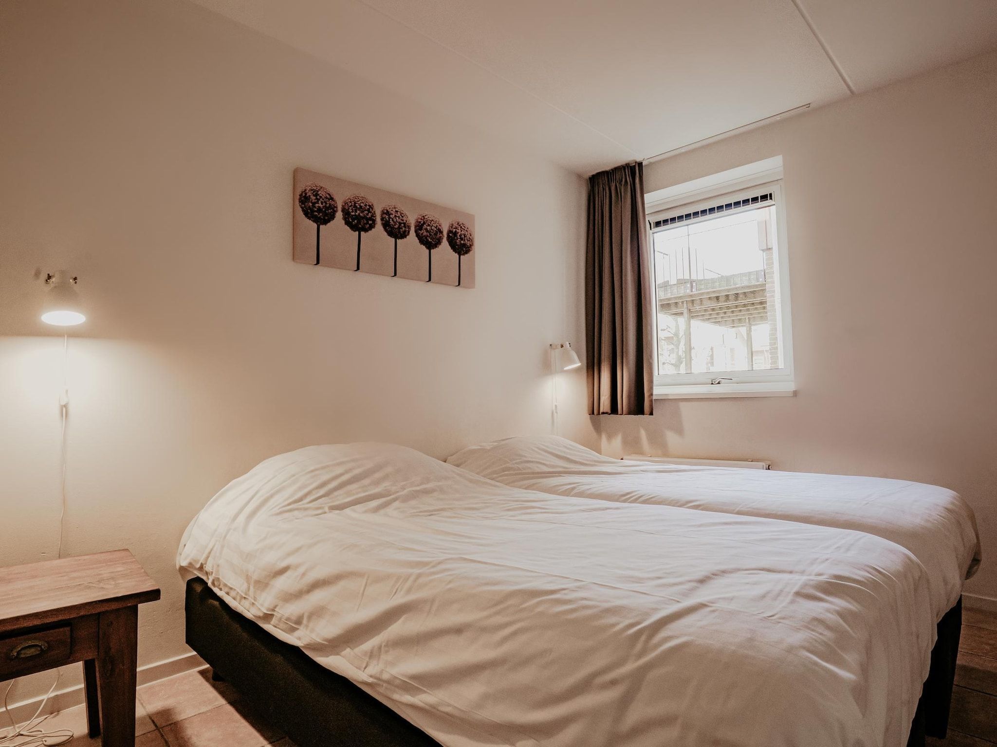 Een slaapkamer van Waterpark de Meerparel 7 in Uitgeest