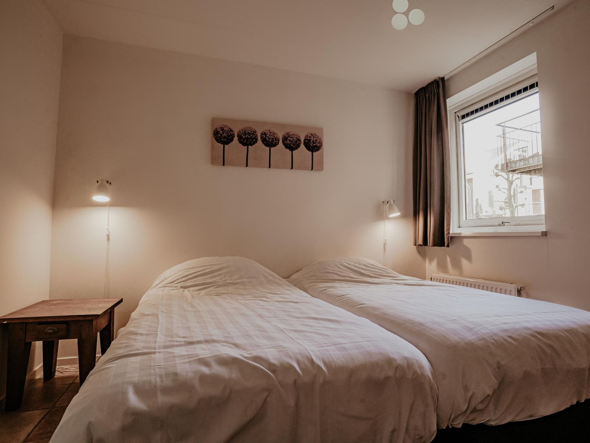 Een slaapkamer van Waterpark de Meerparel 7 in Uitgeest