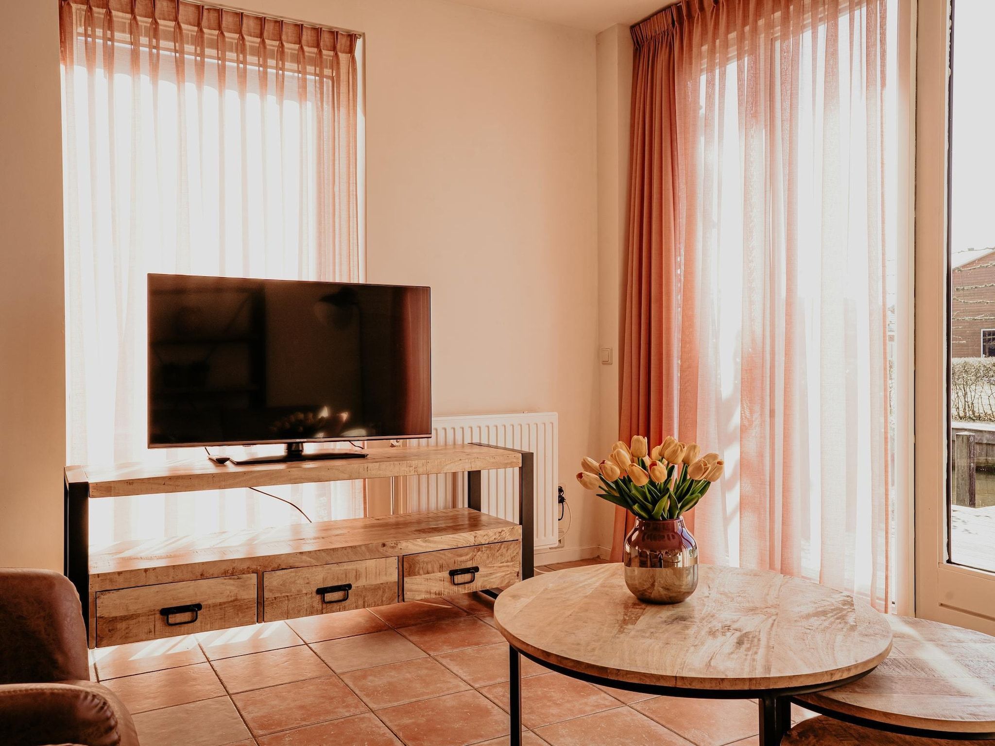 De woonkamer van Waterpark de Meerparel 7 in Uitgeest