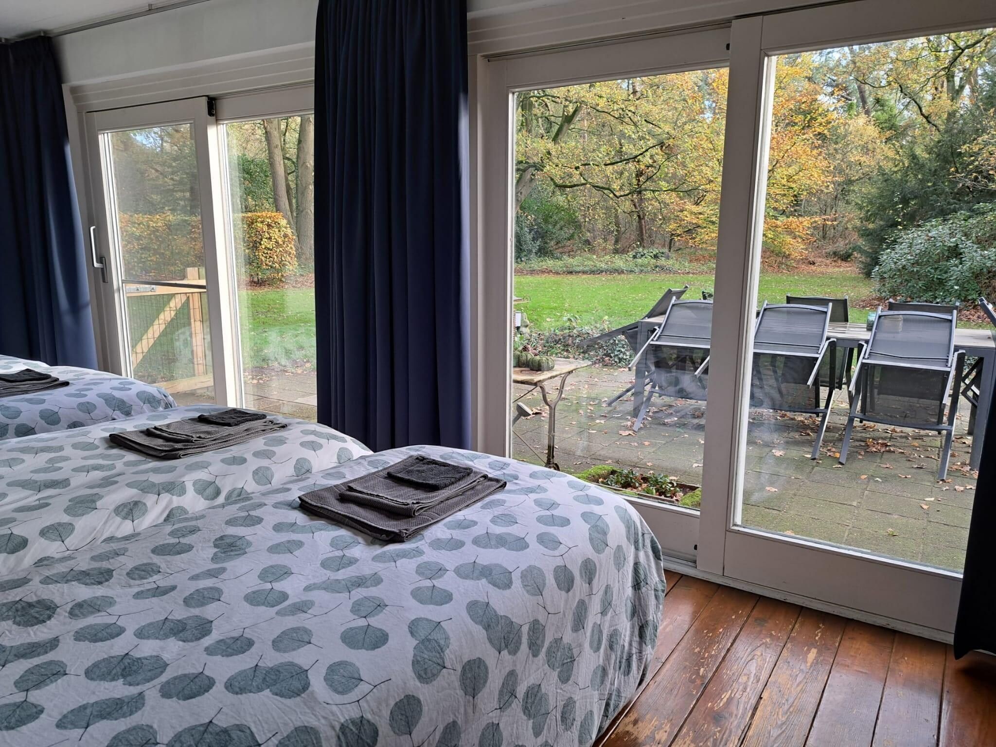 Een slaapkamer van Vier Vogelenzang in Vessem