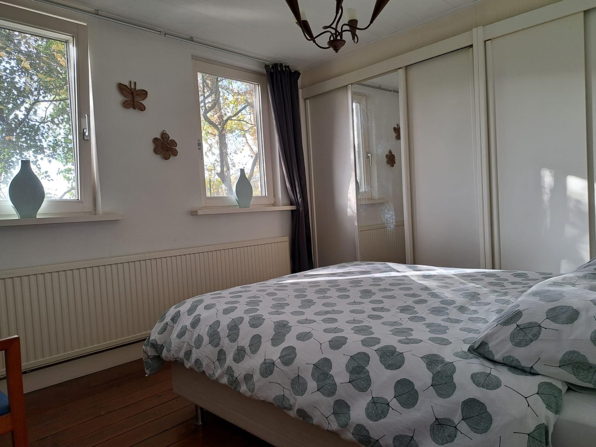 Een slaapkamer van Vier Vogelenzang in Vessem