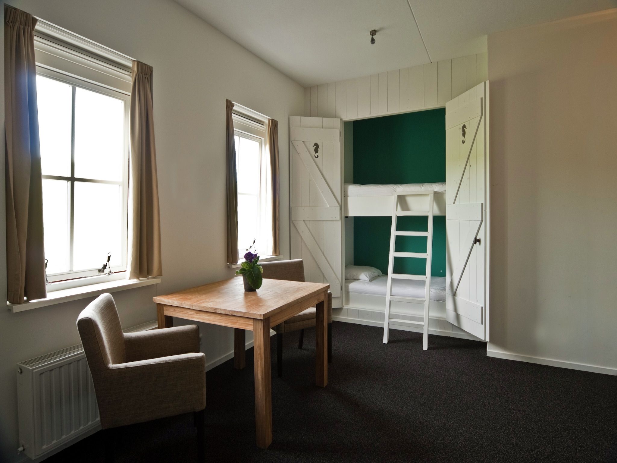 Een slaapkamer van Recreatiepark de Stelhoeve 2 in Wemeldinge