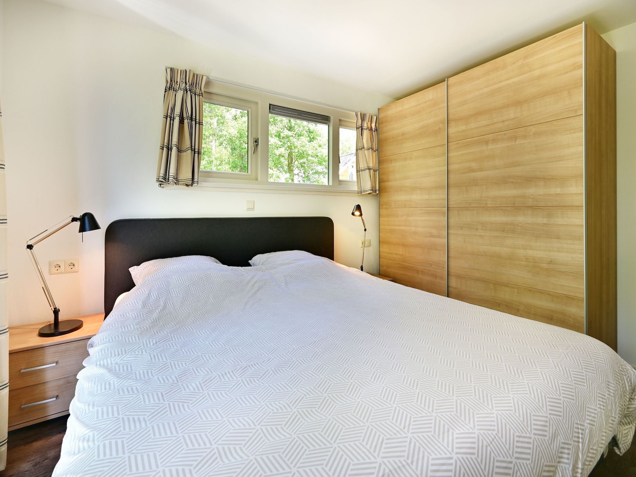 Een slaapkamer van Veldzicht in Reutum-Weerselo