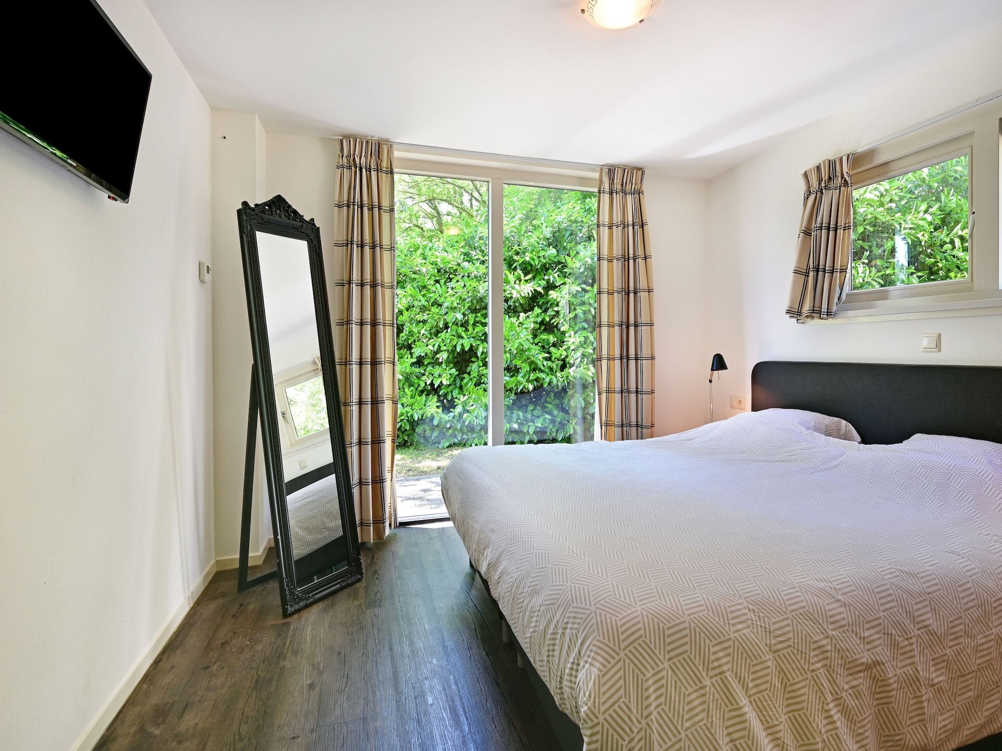 Een slaapkamer van Veldzicht in Reutum-Weerselo