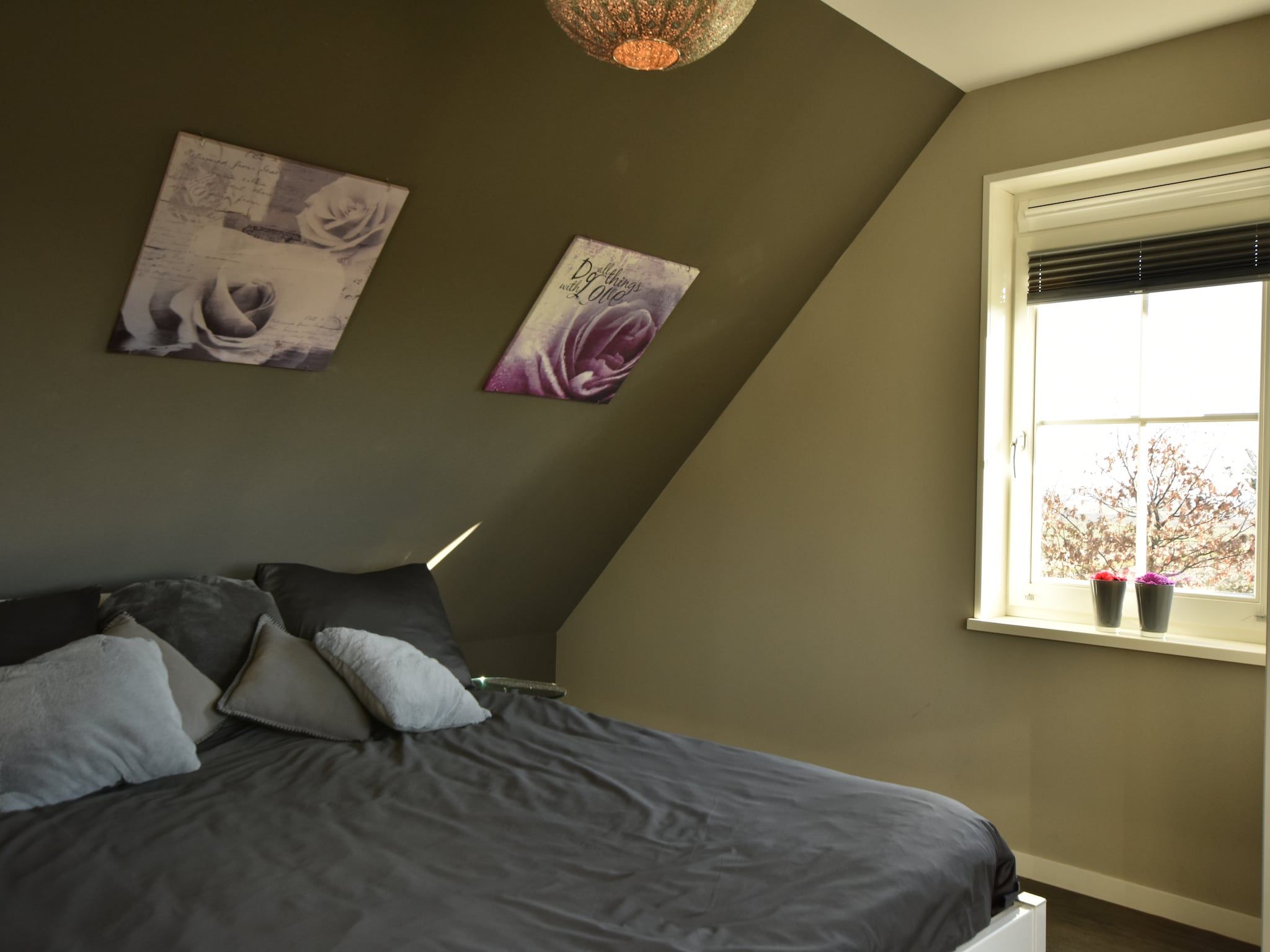 Een slaapkamer van Scoreldame 8-persoons in Schoorldam