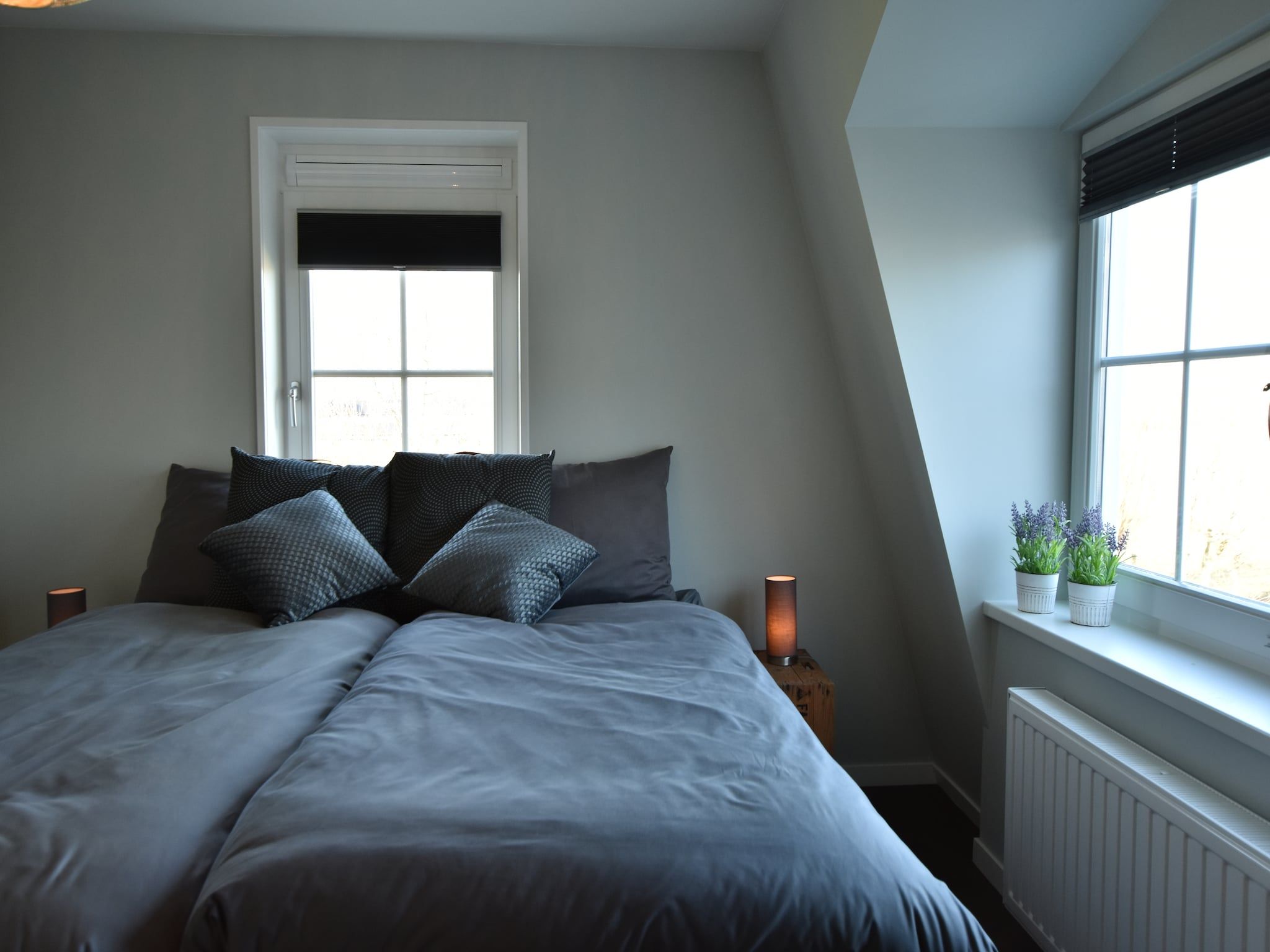 Een slaapkamer van Scoreldame 8-persoons in Schoorldam