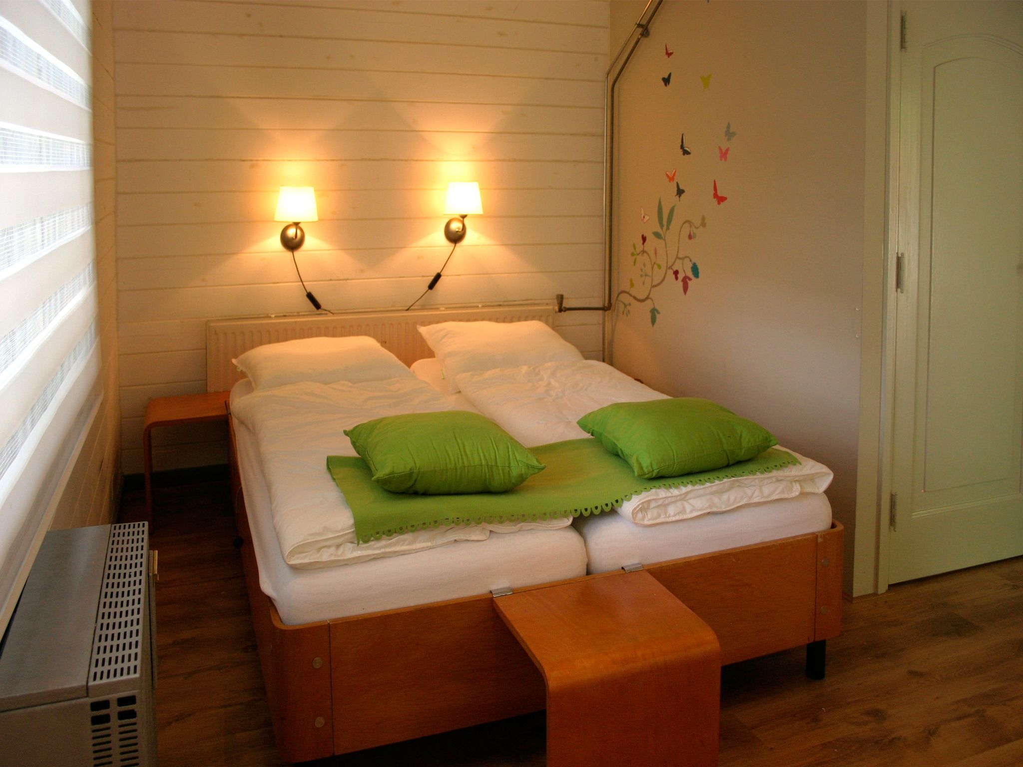 Een slaapkamer van Chaletpark Kuiperberg 1 in Ootmarsum