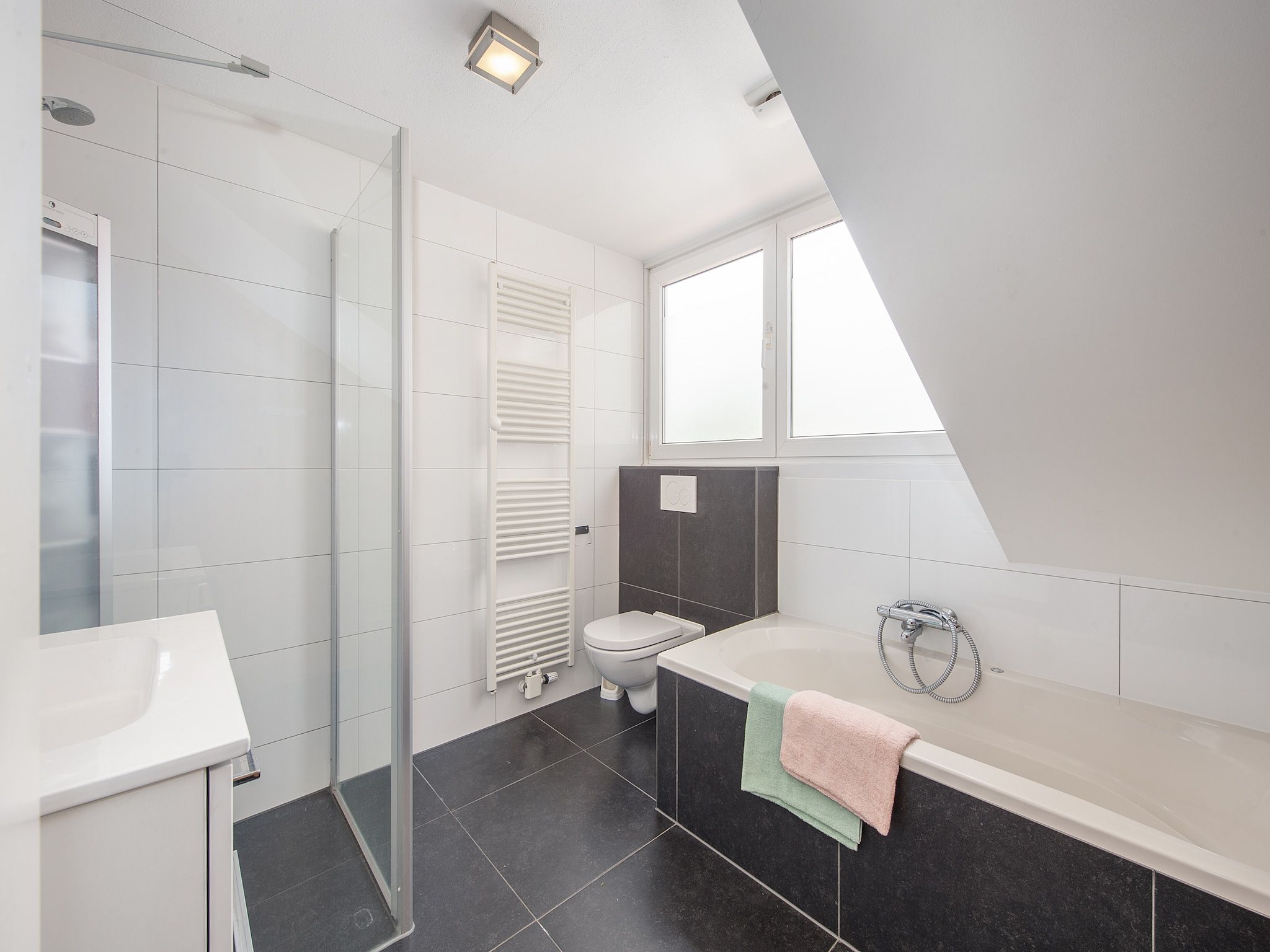 De badkamer van Resort Arcen 12 in Arcen