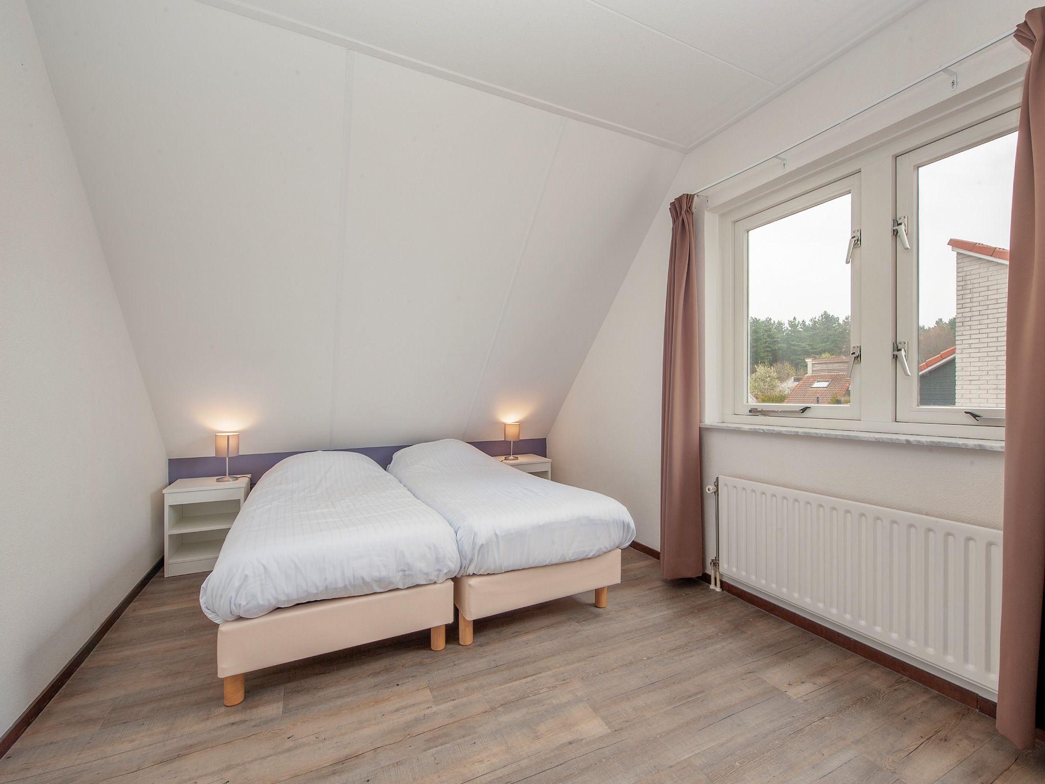 Een slaapkamer van Resort Arcen 1 in Arcen