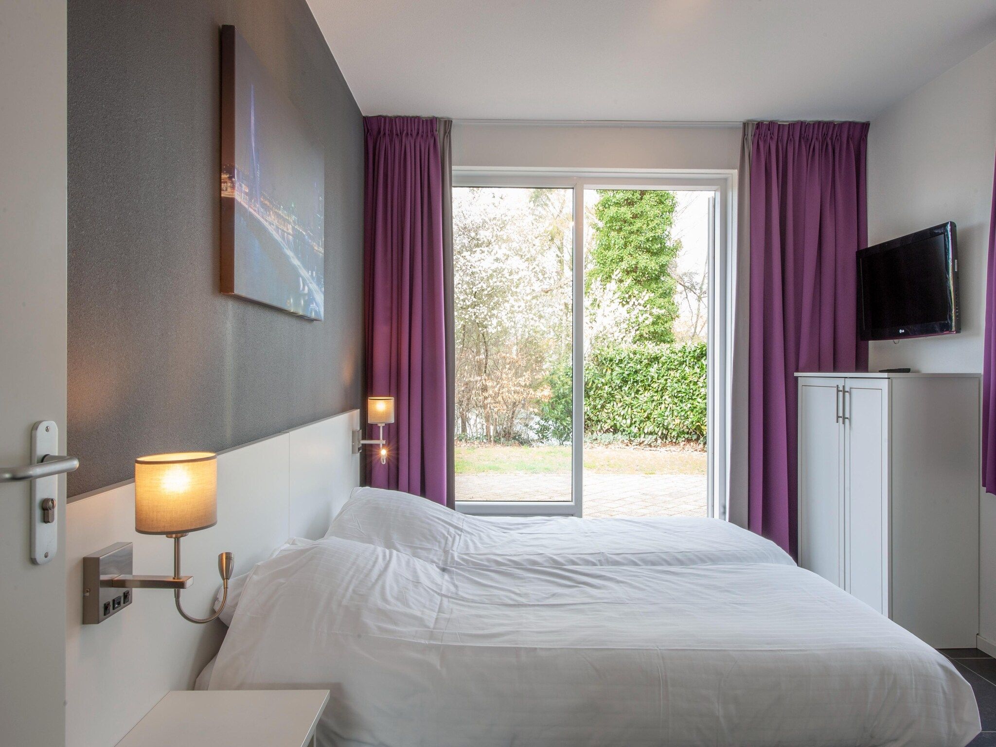 Een slaapkamer van Resort Arcen 5 in Arcen