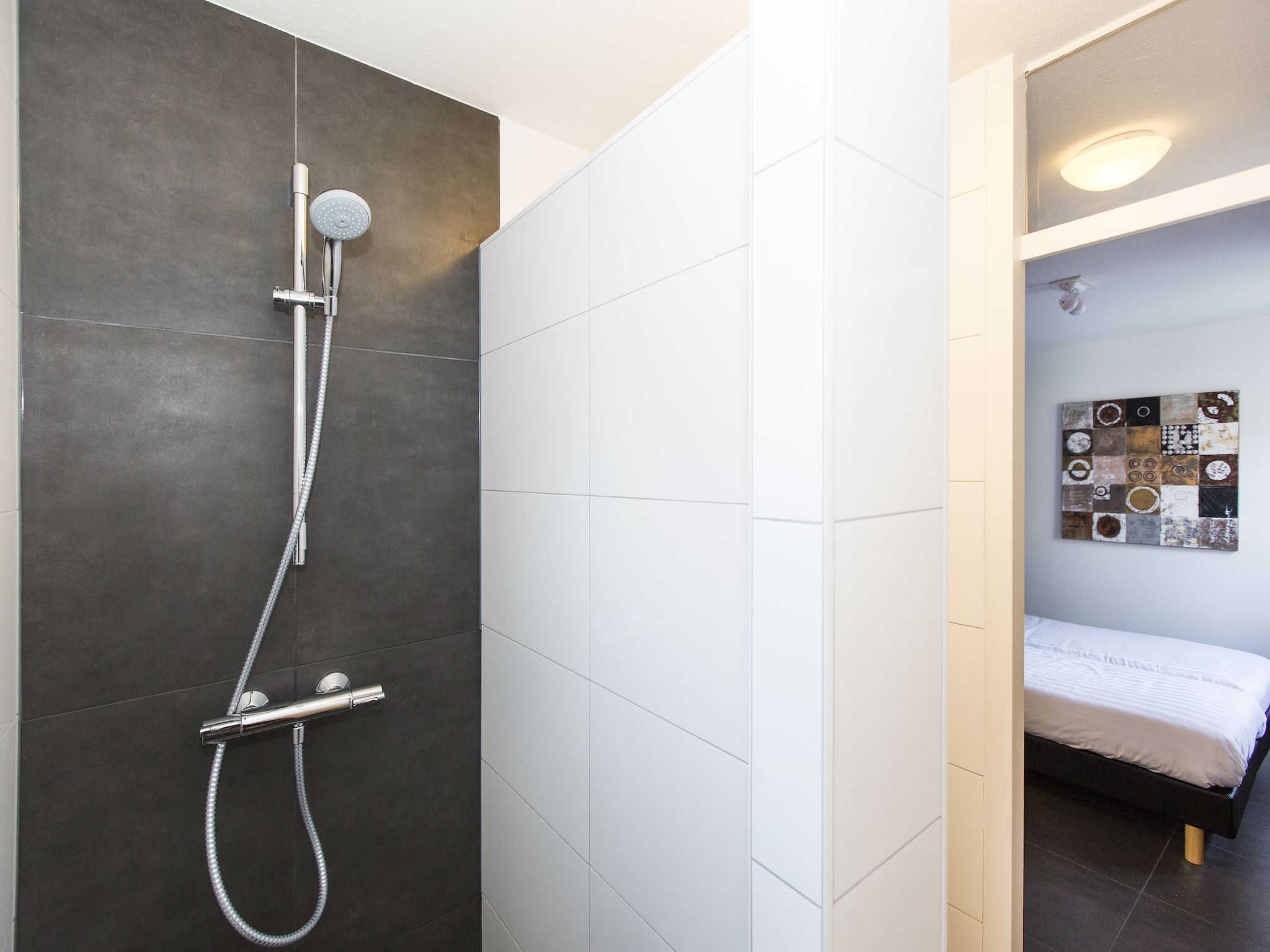 De badkamer van Resort Arcen 14 in Arcen