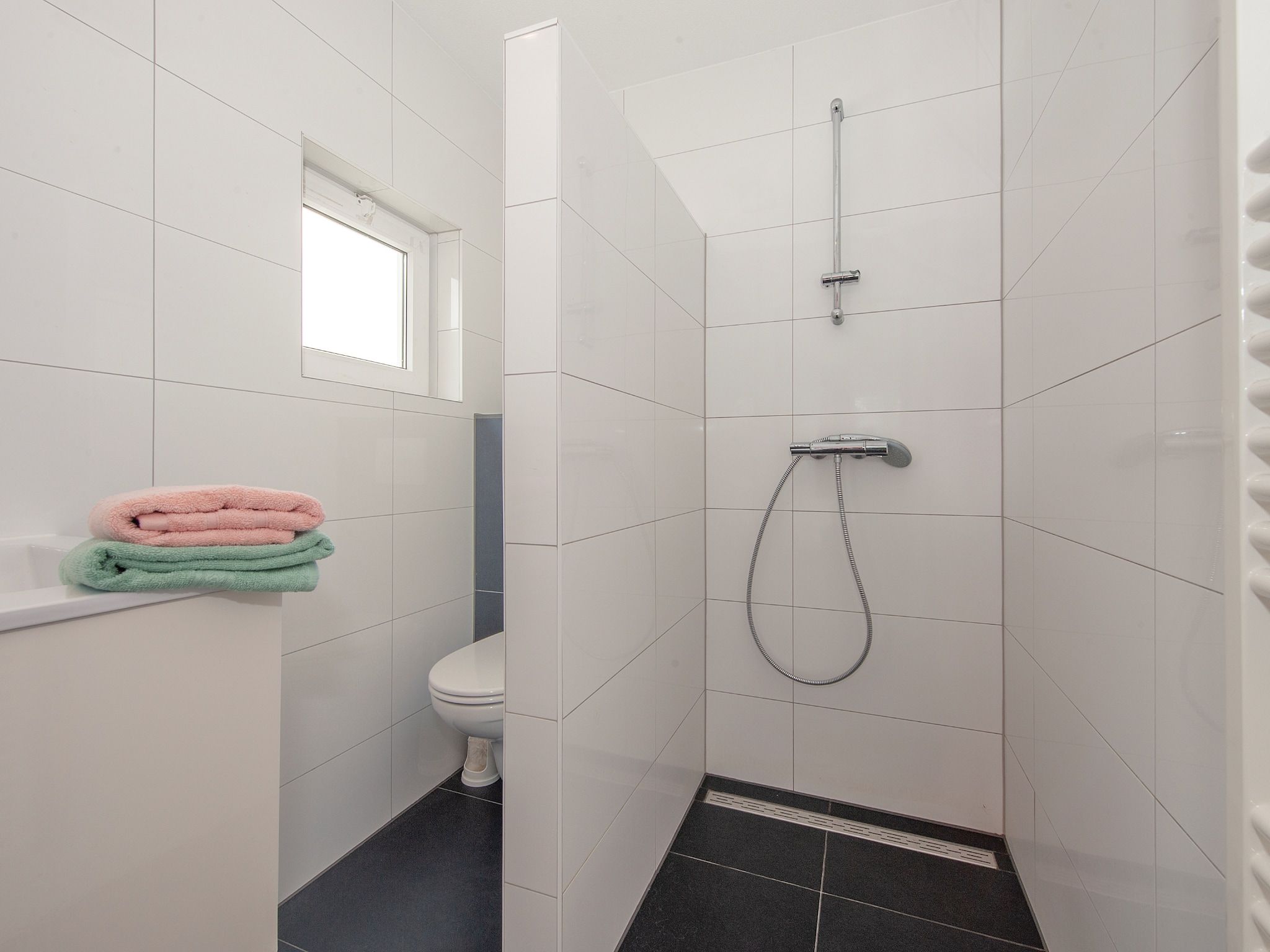 De badkamer van Resort Arcen 16 in Arcen