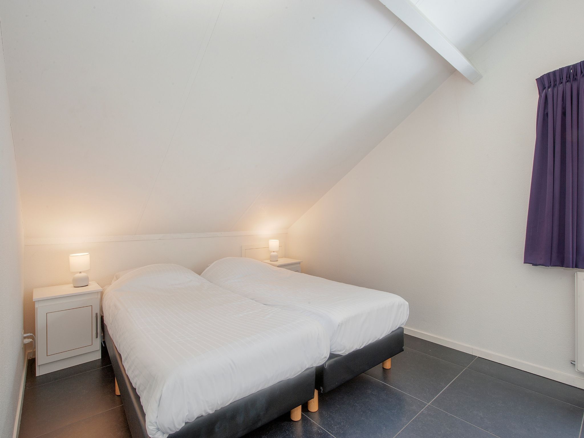 Een slaapkamer van Resort Arcen 9 in Arcen