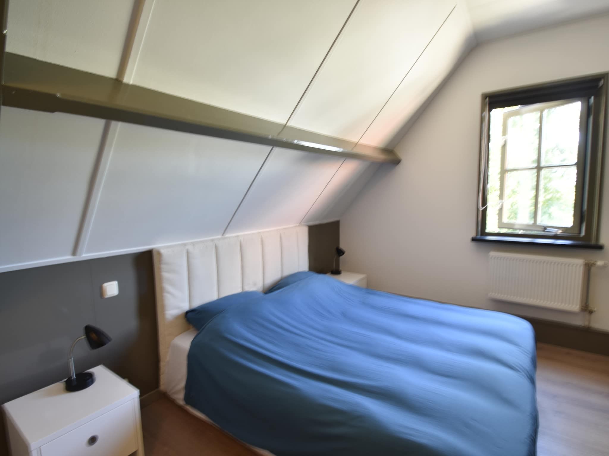 Een slaapkamer van Harrekidee in Sint Maartensbrug