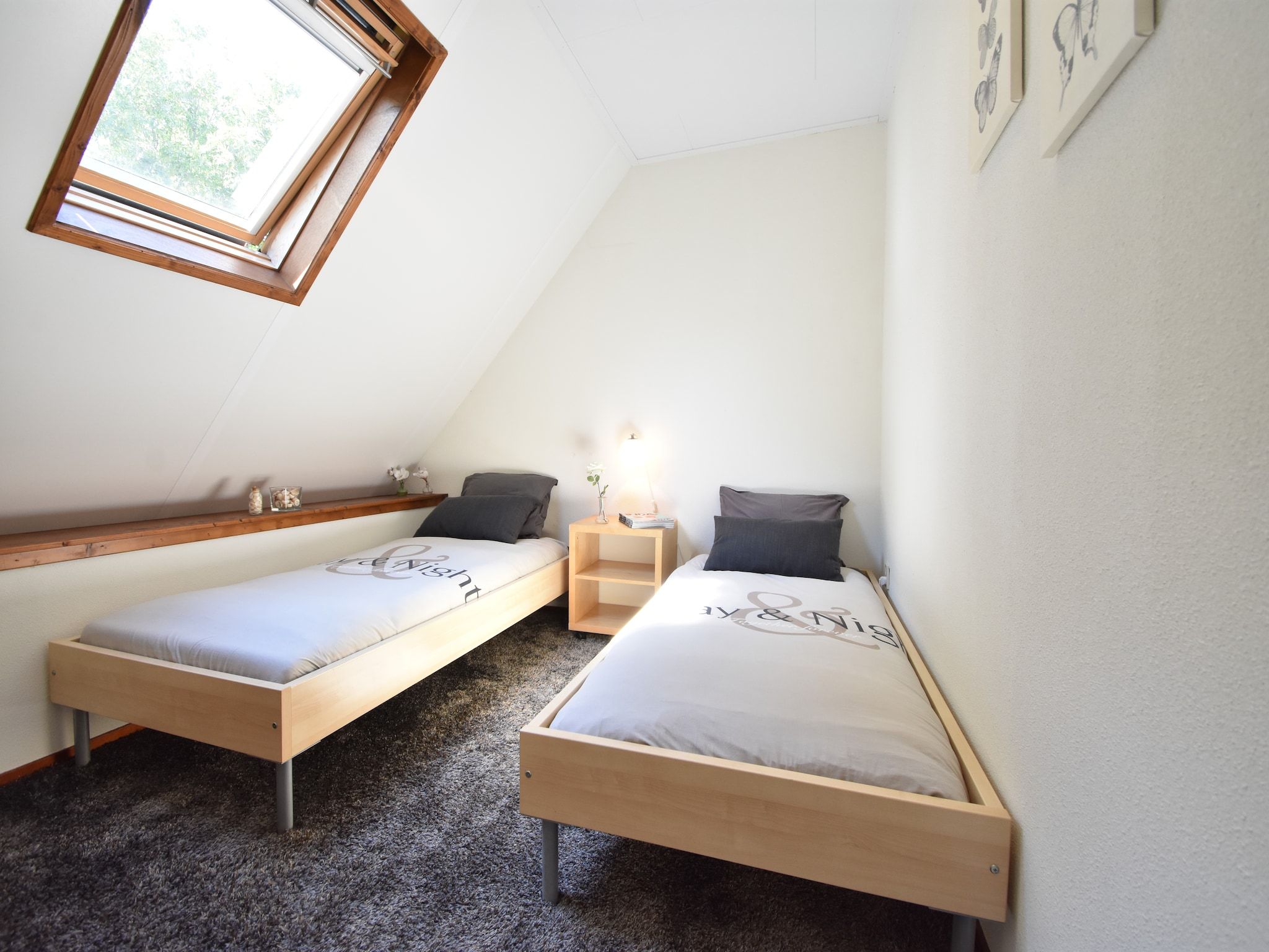 Een slaapkamer van De Notenweide in Zonnemaire