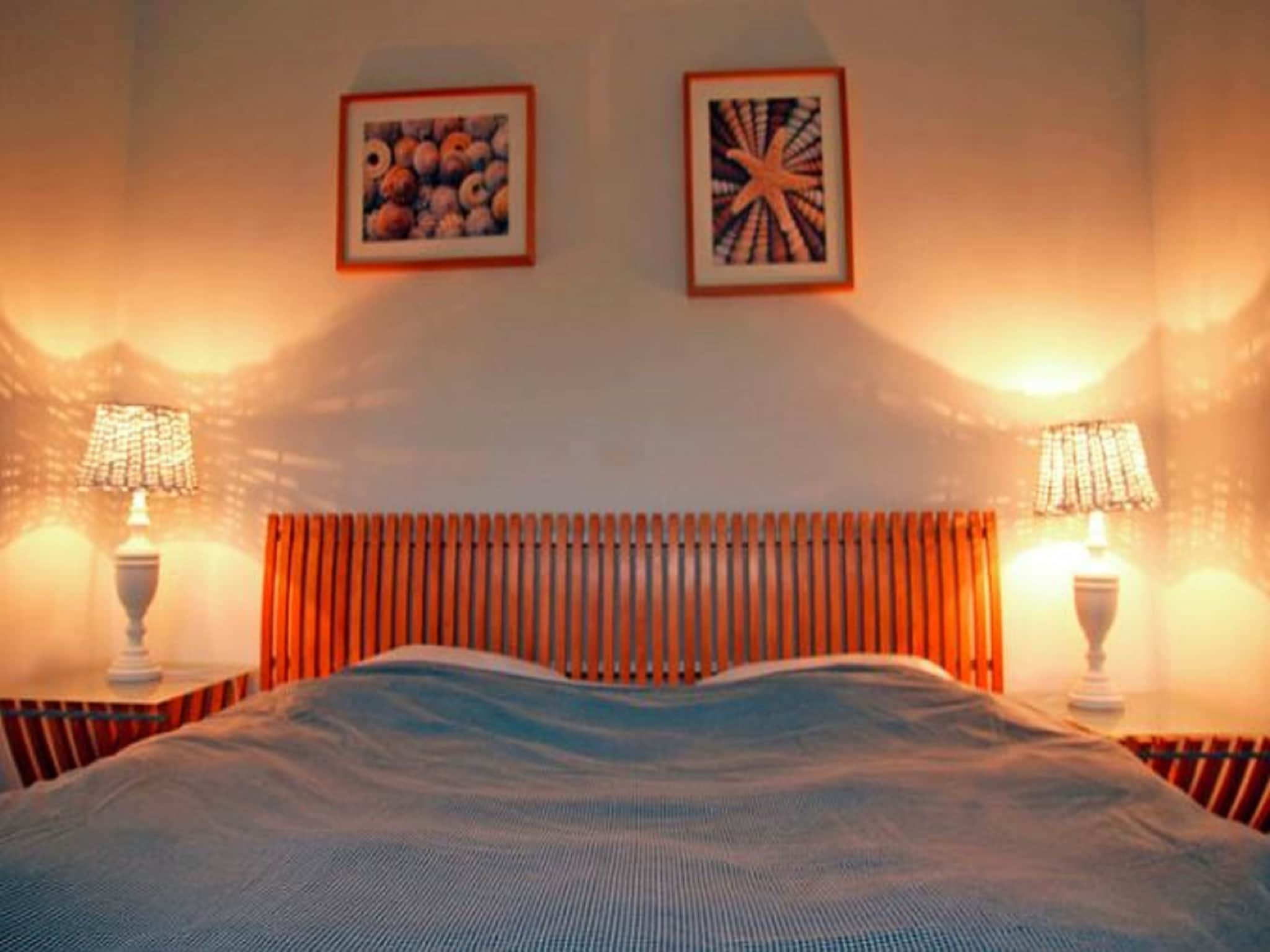 Een slaapkamer van Helmgras I in Egmond aan zee