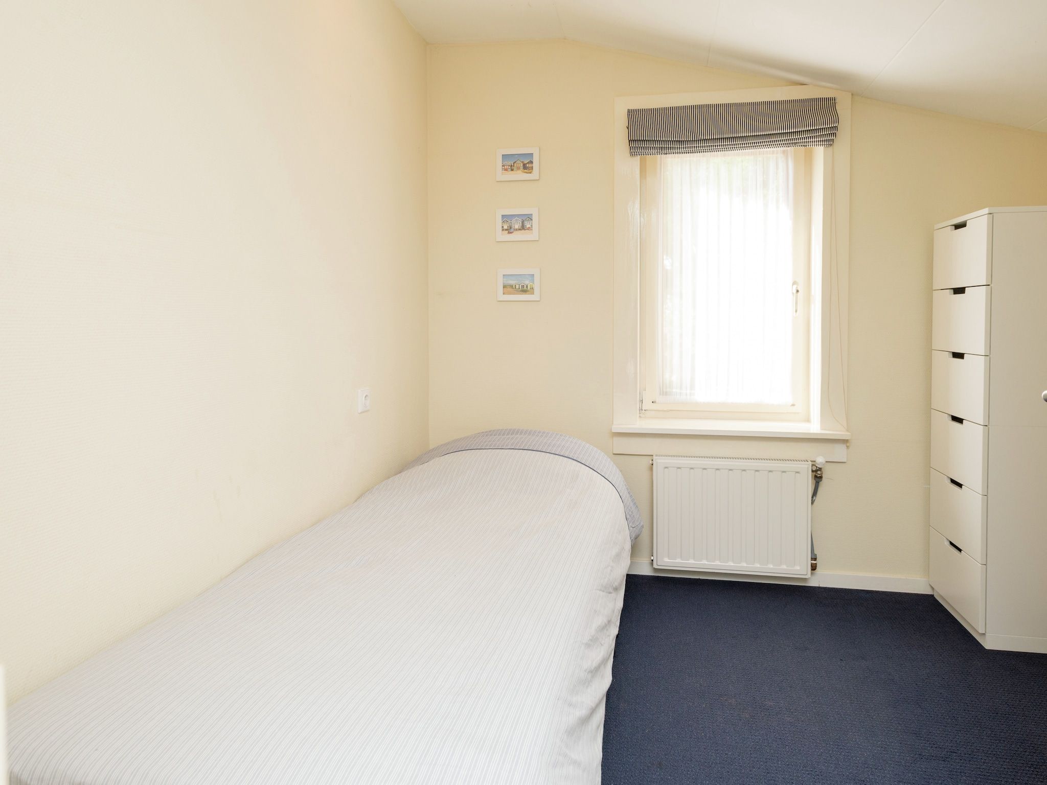 Een slaapkamer van De Strandvogel in Julianadorp