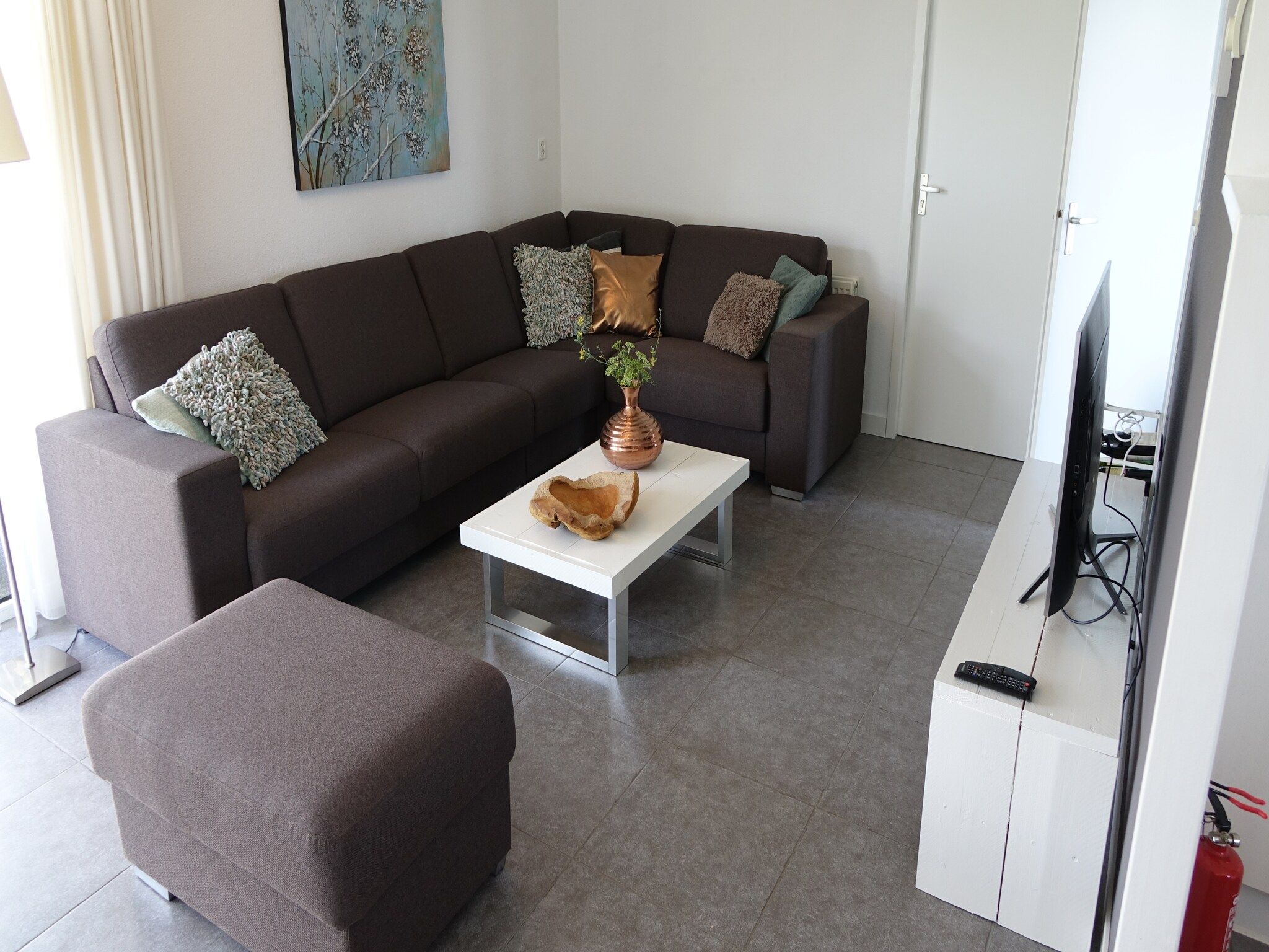 De woonkamer van Wellness aan het Water in Eernewolde in Earnewald