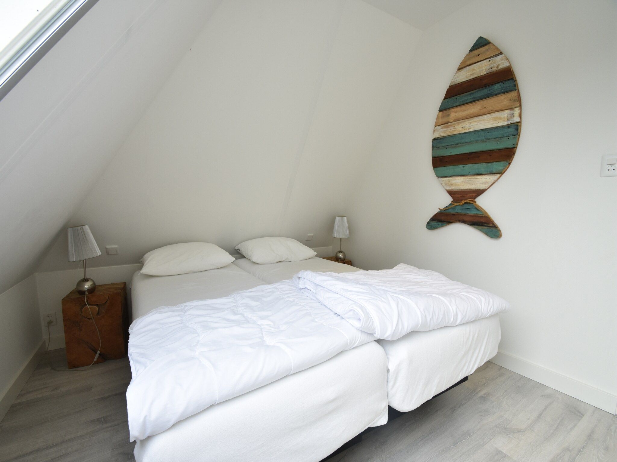 Een slaapkamer van Wellness aan het Water in Eernewolde in Earnewald