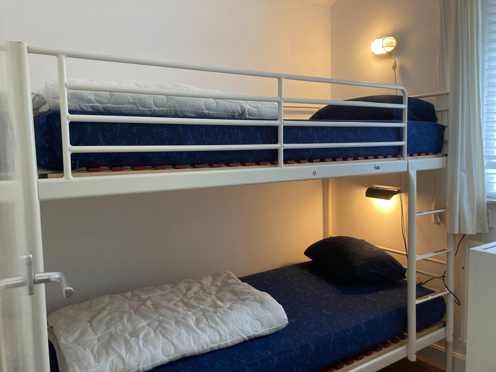 Een slaapkamer van Zeeroos in Koudekerke-Dishoek