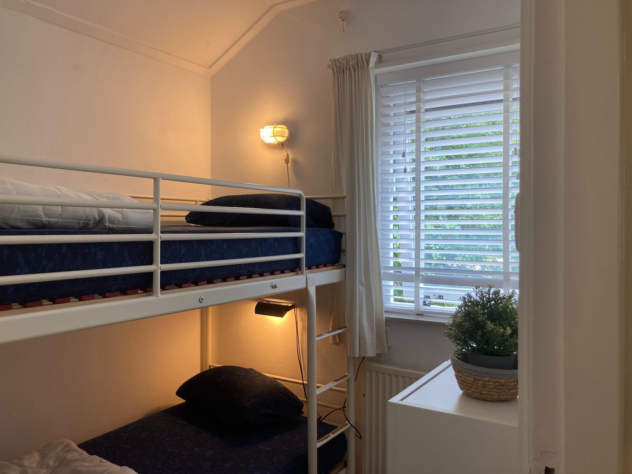 Een slaapkamer van Zeeroos in Koudekerke-Dishoek