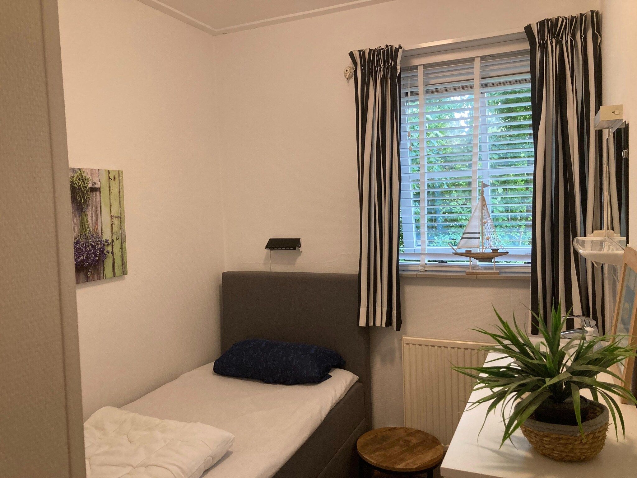 Een slaapkamer van Zeeroos in Koudekerke-Dishoek