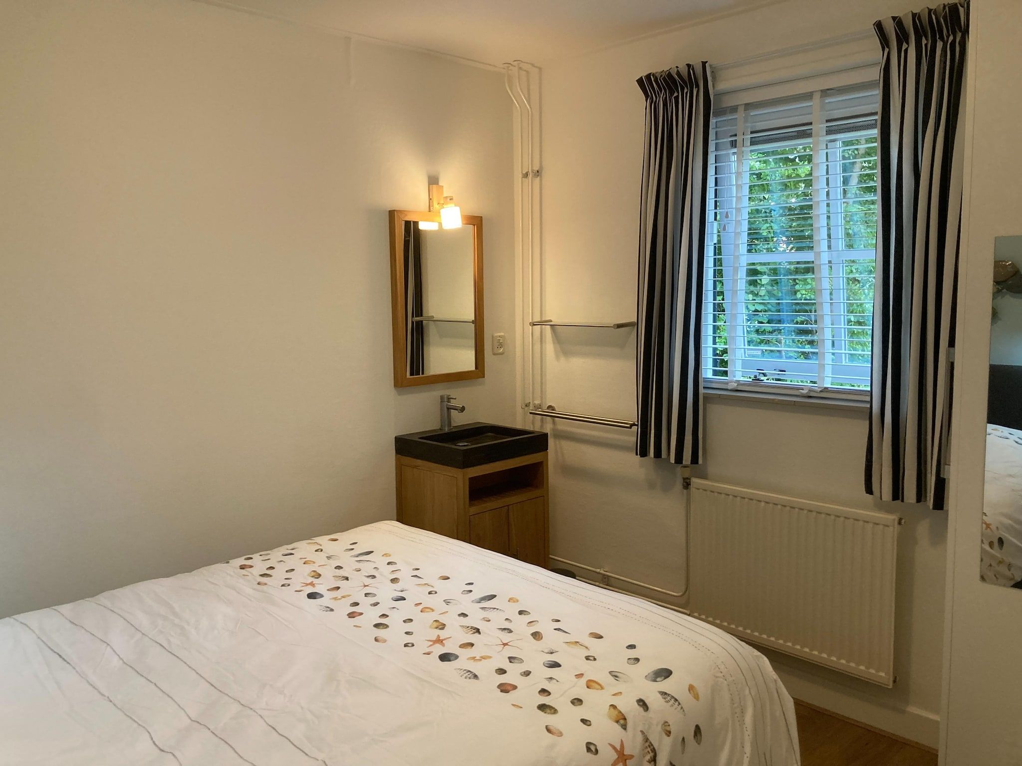 Een slaapkamer van Zeeroos in Koudekerke-Dishoek