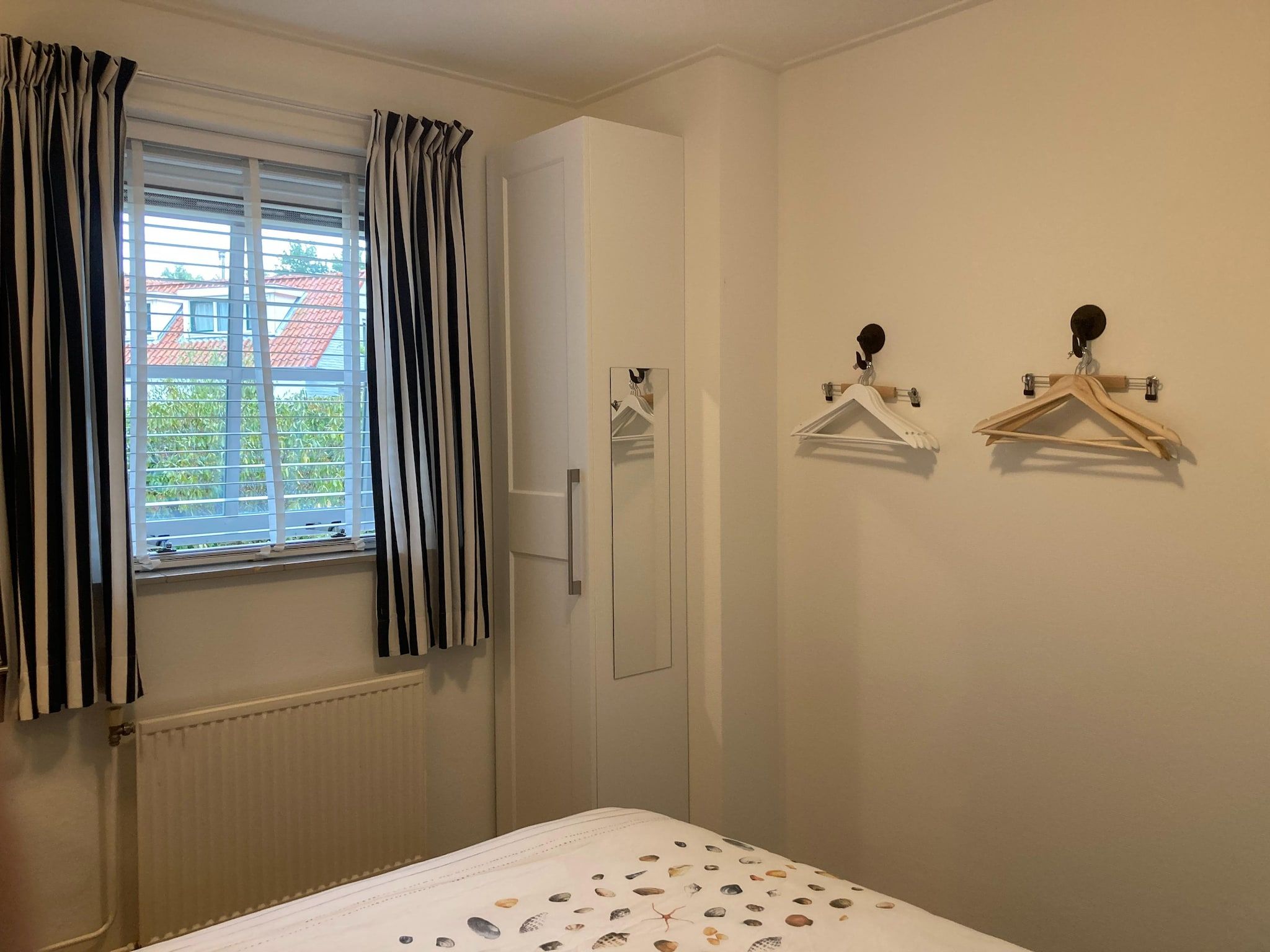 Een slaapkamer van Zeeroos in Koudekerke-Dishoek
