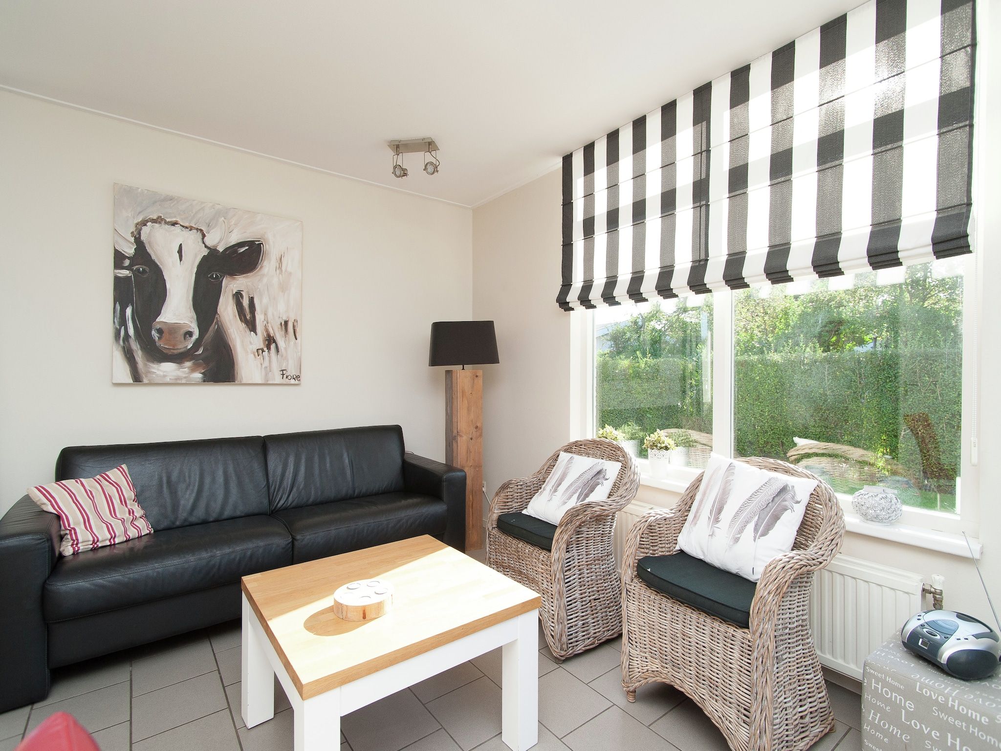 De woonkamer van Bungalowpark de Gouden Spar 2 in Noordwijk