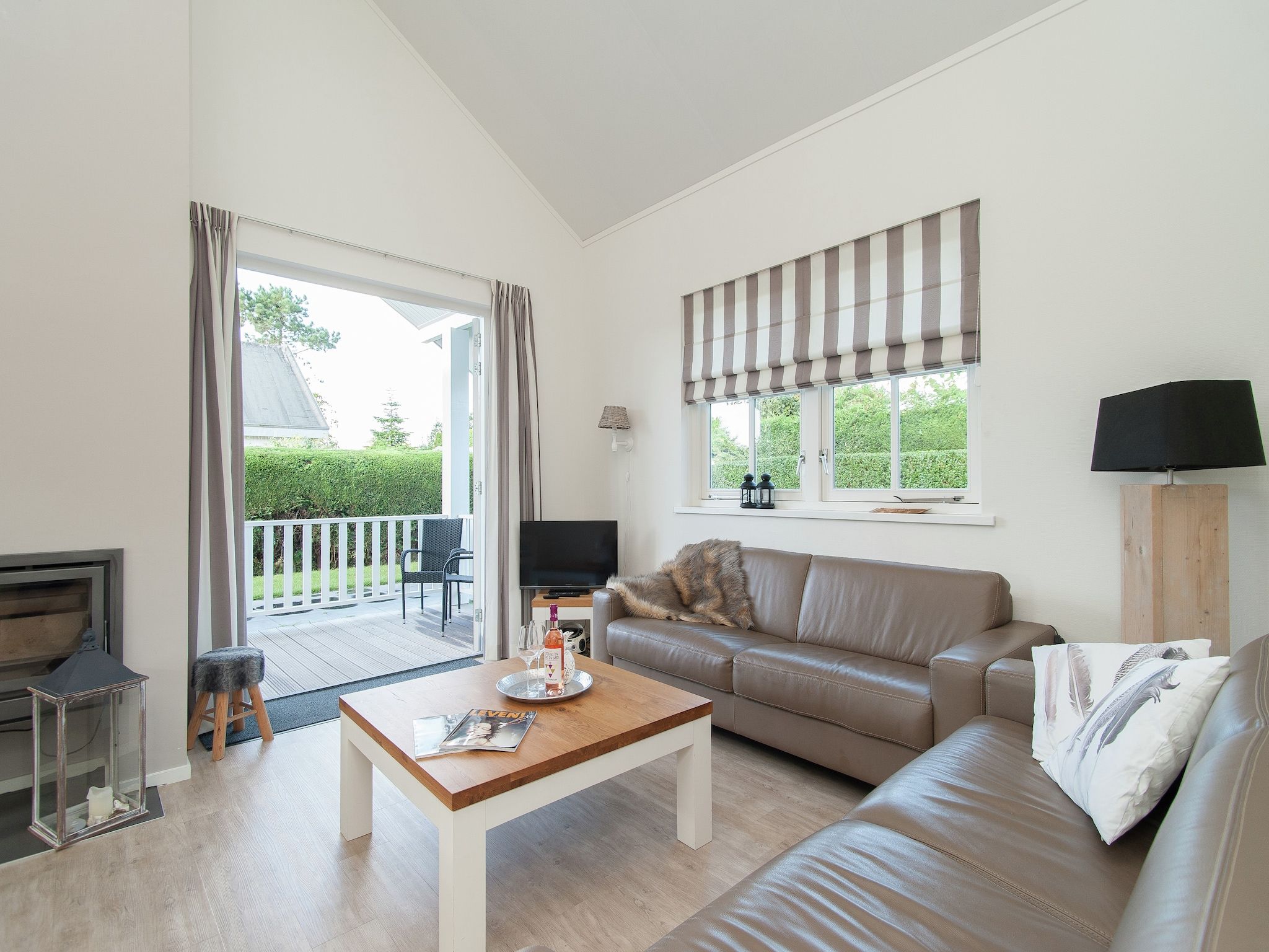 De woonkamer van Bungalowpark de Gouden Spar 3 in Noordwijk