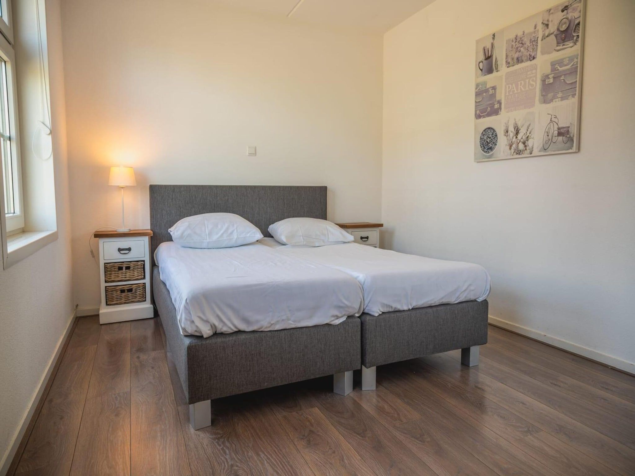 Een slaapkamer van 	Waterland  8 personen in West-Graftdijk