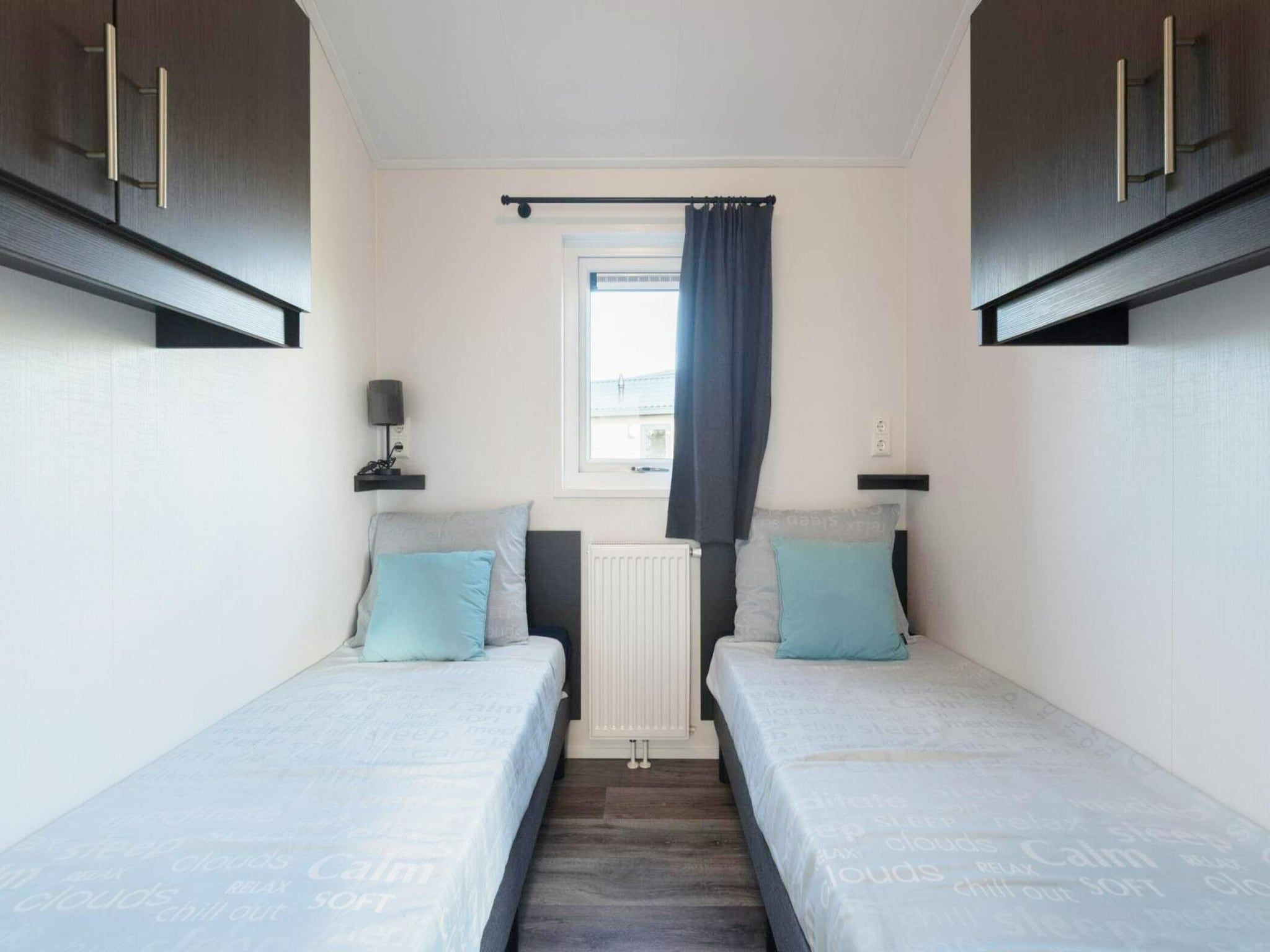 Een slaapkamer van De Edammer  4 personen in West-Graftdijk