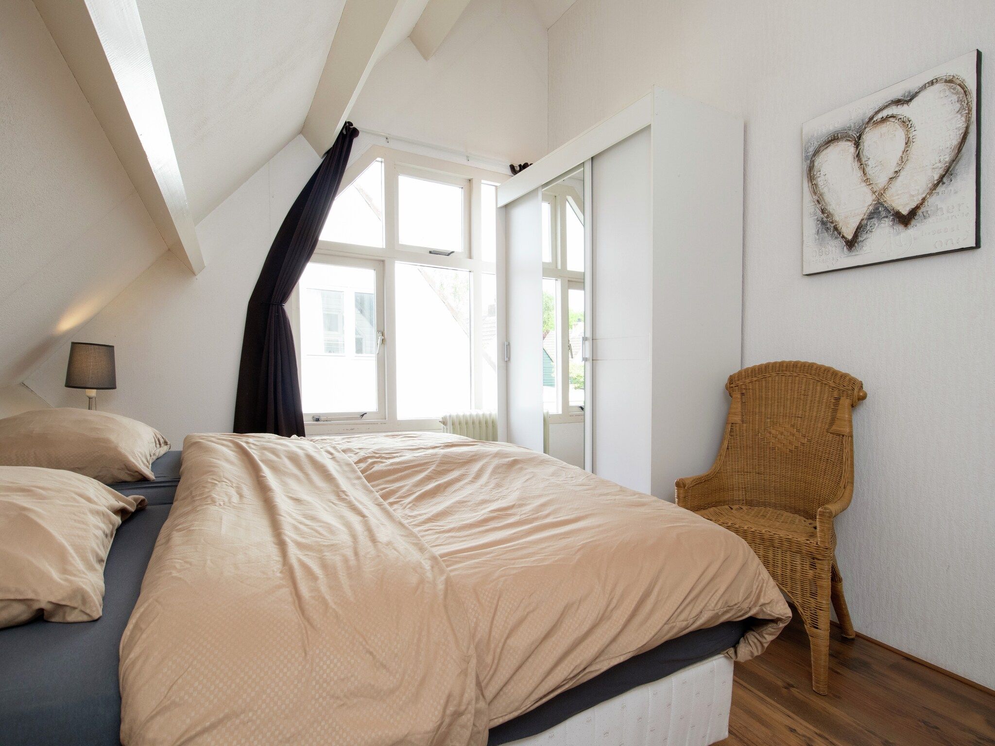 Een slaapkamer van Como in Noordwijkerhout