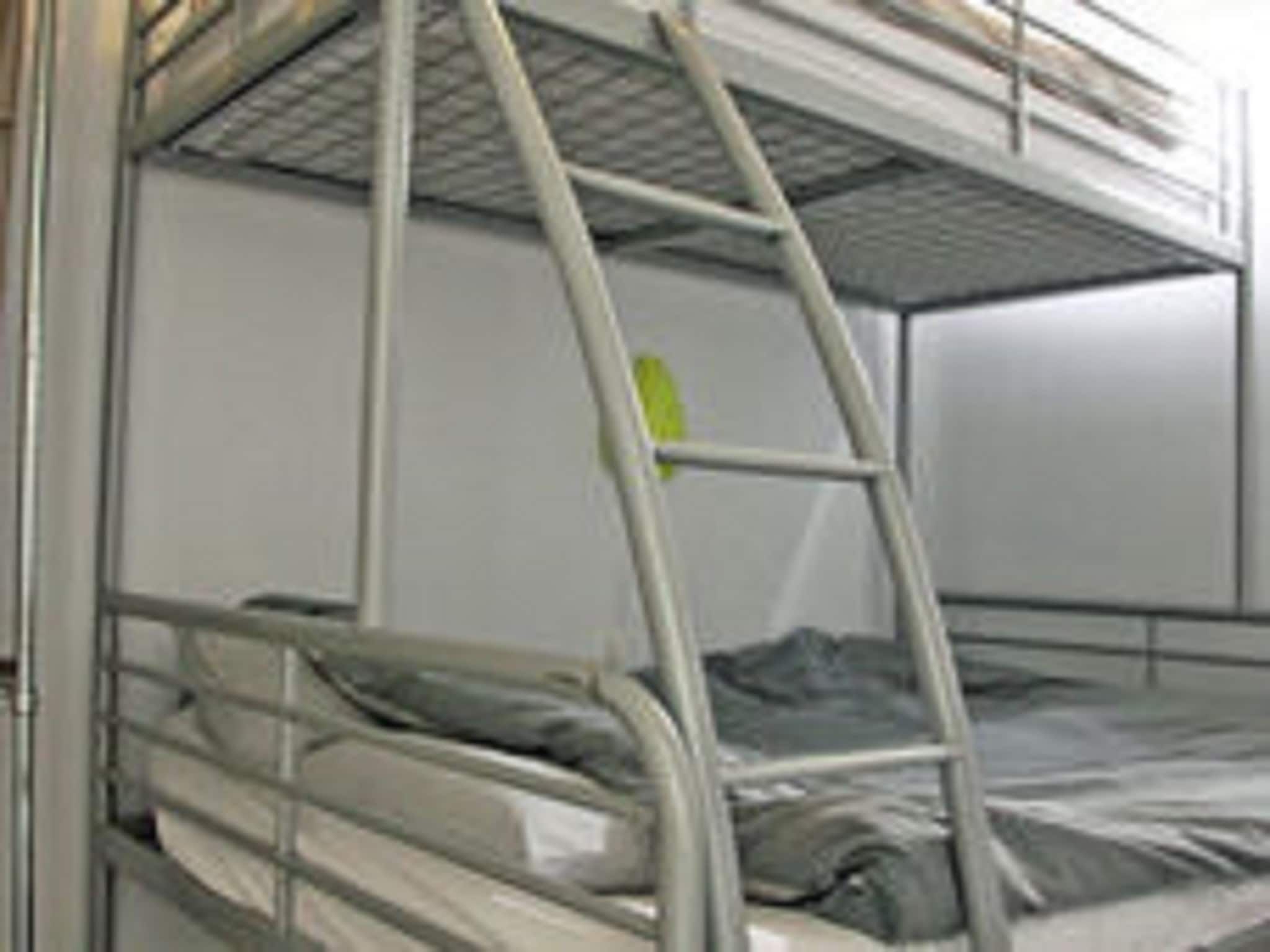 Een slaapkamer van Helmgras II in Egmond aan zee