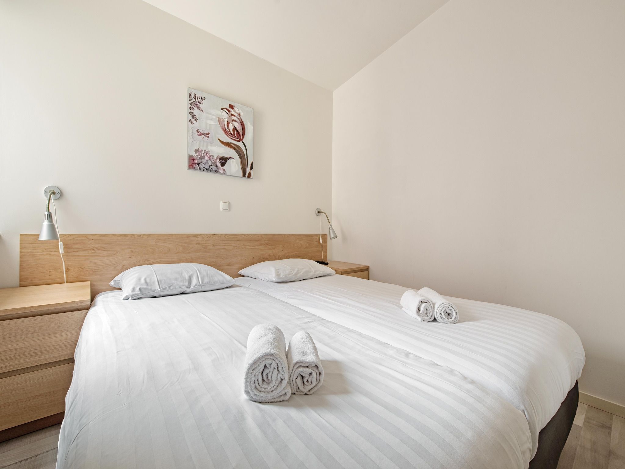 Een slaapkamer van Bungalowpark Schin op Geul 6 in Walem